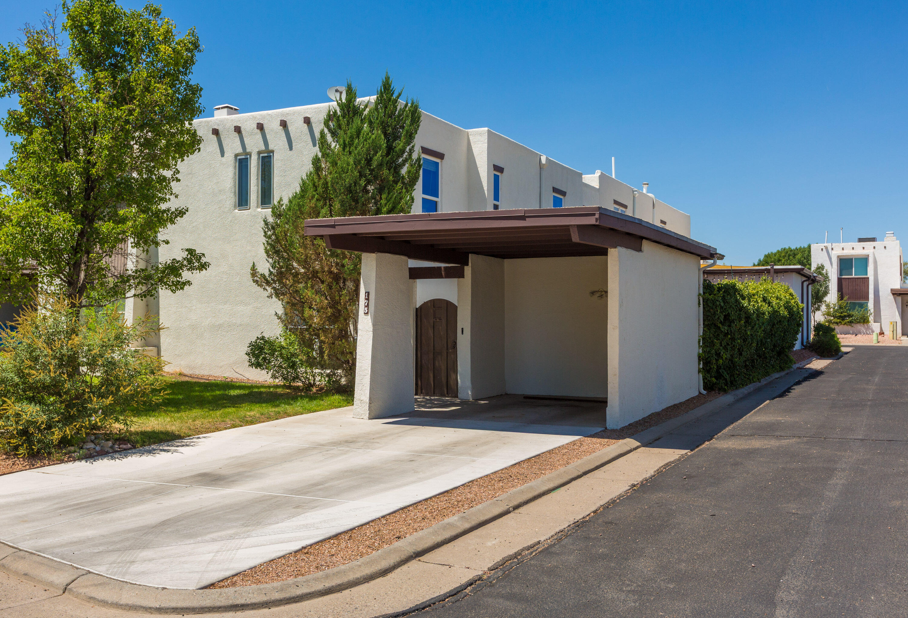 Ooo la la!  This is a really nice townhome in a convenient location.  The owner has done a lot to make this desirable through the years.  It has a brand new roof!   Nothing to do here except move in!  There's a private courtyard and a security door plus storage. You'll love the park and swimming pool! All the appliances stay...HOA pays for trash, water and front yards, community park and pool.