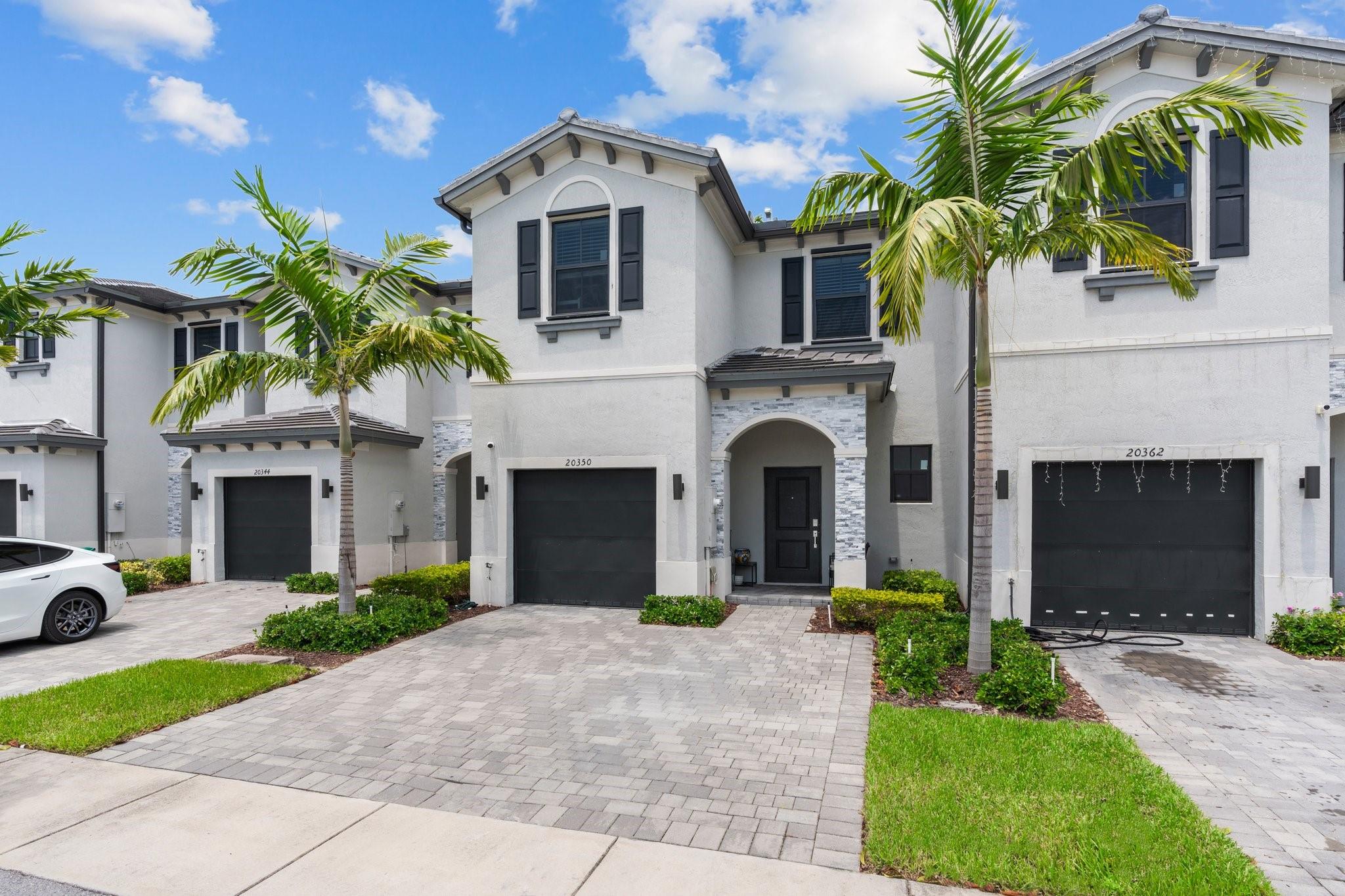 Welcome to this stunning, modern 3-bedroom, 2.5 townhouse with 1 car garage located within a gated community! This property was built in 2023 and features kitchen granite counter tops, stainless steel appliances, and sleek cabinets. This home features an open floor concept with a built in Smart Home System. Additional upgrades include a concrete back patio and laminate flooring throughout the second floor. This community features amazing amenities including a clubhouse, pool, fitness center and children's playground. Washer and dryer do not convey. This home is priced to sell quickly. Please schedule your private showing today!