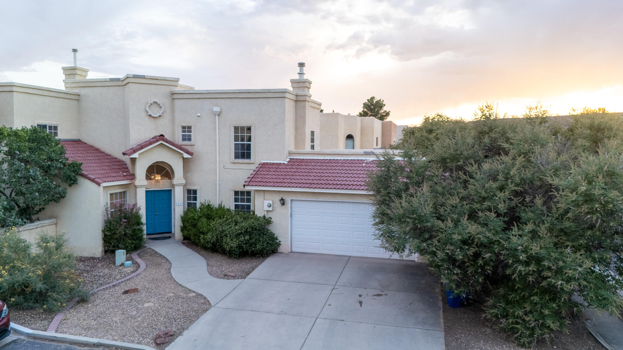 Come & see this wonderful townhome that overlooks Ladera Golf Course! As you enter you are greeted with a grand entry, warm fireplace in your living room, Large kitchen with ample storage, bar top, and two pantry's, and a great sized dinning area! Before you head to your main level bedroom or office you will have access to your private courtyard that will have you feeling like you're in a European villa! Large utility room, and oversized garage add to all the storage this home has! Great sized bedrooms upstairs with each room providing views of the Sandia's, West Mesa, and Ladera golf course, Your Primary is a large suite with a wrap around private balcony that over looks the golf course and city. Newer TPO roof, updated zoned radiant heat and newer master cooler systems! Schedule today!