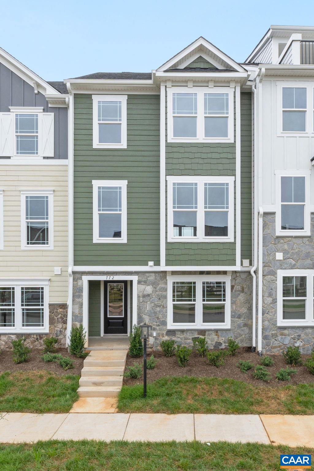 Just completed - actual photos! The Poplar II Townhome in Glenbrook, set among Blue Ridge Mountain views, parks and walking trails, yet minutes from downtown Crozet. This earth-friendly, farmhouse-style interior townhome will undoubtedly wow you – from the fresh architecture featuring real stone, the generously sized kitchen and walk-in pantry offering both ample storage + prep space, elevated rear deck perfect for sipping your morning coffee, and first floor rec room! Thoughtful and quality included features throughout, including a 2-car attached garage, oak stairs, solid core doors, wood shelving, upgraded trim, energy efficient furnace, the list goes on. Walking Path to Crozet Park and future direct access to Downtown Crozet.