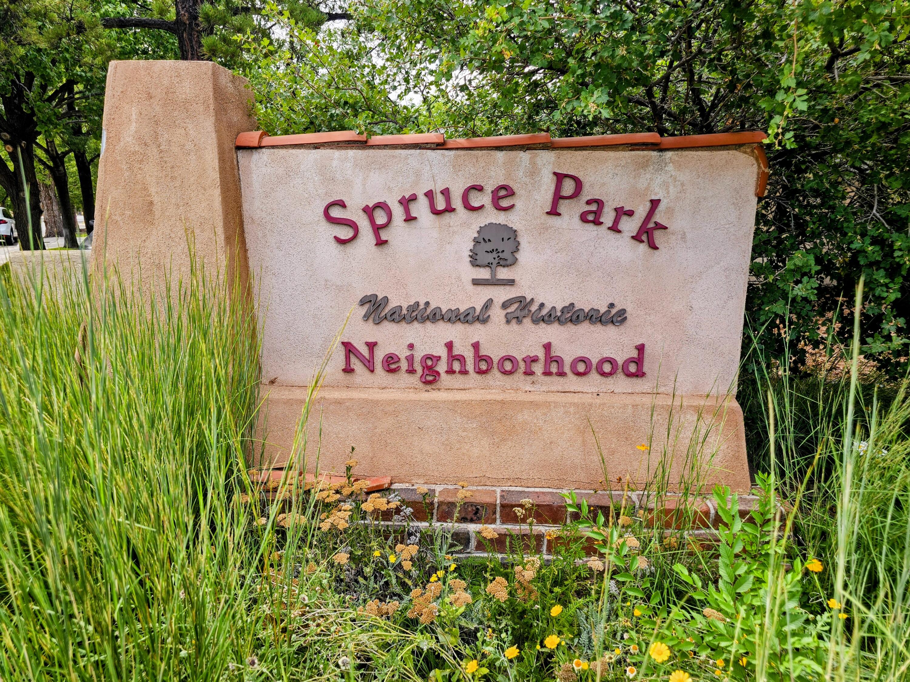Welcome to Spruce Park a one of a kind historic neighborhood located in a vibrant area of Albuquerque. Situated minutes from the University of NM, UNMH, Nob Hill, Downtown, and I-25. Enjoy its name sake park centered within the neighborhood, local breweries, restaurants, and Popejoy Hall!This home features brick floors and southwest accents throughout. 2 spacious living areas, 3 fireplaces, 5 bedrooms and 4 bathrooms (3 are ensuite), 2 laundry areas (one conveniently located in the primary closet). Tastefully updated kitchen showcasing custom cabinetry and granite counters. Open, light and bright with views of the Sandias. Host gatherings on the massive upper deck overlooking the beautiful neighborhood and lush landscaping. Welcome Home!Check out:Spruceparkneighborhood.com