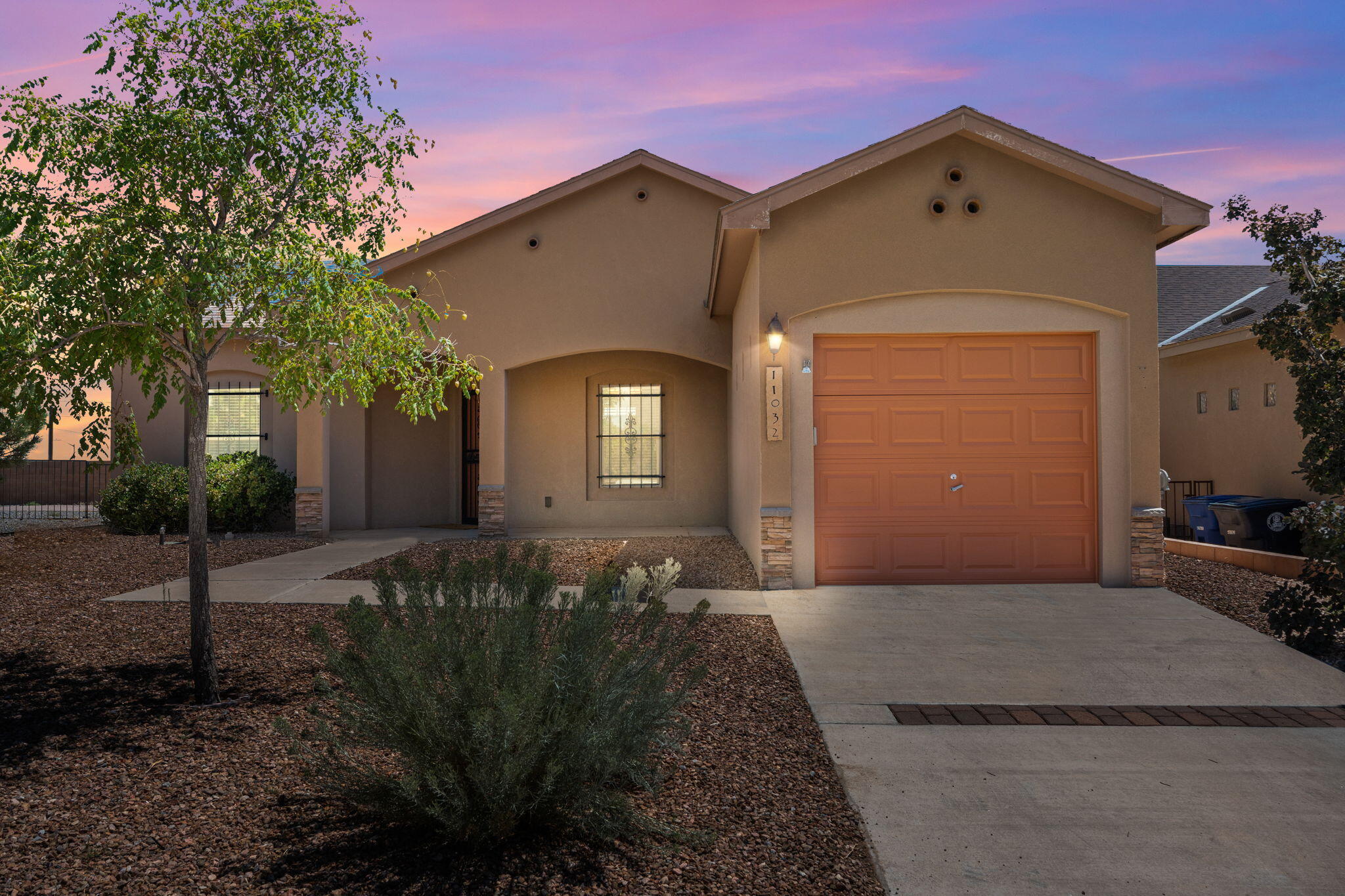 Incredible opportunity to own a Paul Allen Certified Bronze level GREEN Built Home for under $300k! This gorgeous home features stacked stone accents, cobblestone accent in driveway and two-tone stucco finish. Enter the home through the spacious covered front patio and enjoy an open concept floorplan with kitchen open to living room. Enjoy the beatifully landscaped and low maintenance backyard with covered patio while looking out to the Sandia Mountains!Stay cool inside with refrigerated air and take advantage of low energy bills with Low-E window and  R-39 insulation! No carpet inside home and ADA friendly! Located minutes from Rust Medical Center, shopping, restaurants and everyday conveniences. This one won't last!