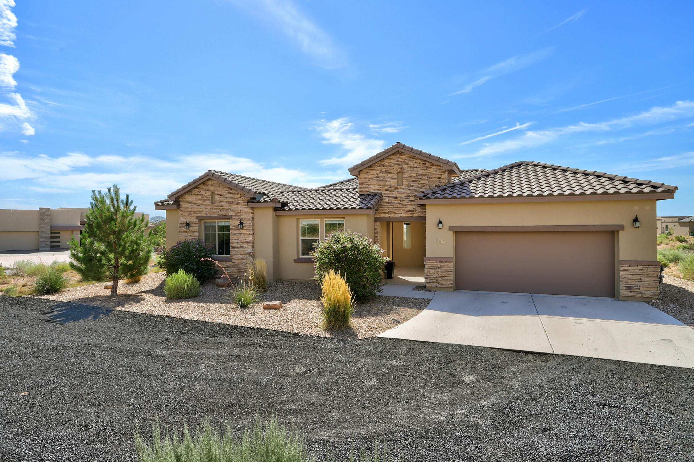 Stunning home in Mariposa situated on a little over a .50 acre, with jaw dropping city and mountain views, this home is on a cul-de-sac and offers fantastic privacy! This single story home has natural light flowing through the windows that capture the mountain views! Floor to ceiling tiles gas fireplace, large chef kitchen with an oversized island! Primary suite is in it's own wing and offers 2 large walk in closets and a luxurious bathroom! The additional bedrooms are on the other side of the home and those rooms have their own flex area that is so versatile and ready for your imagination, gym, office, additional bedroom, movie room... Stop by this home and you will not want to leave!