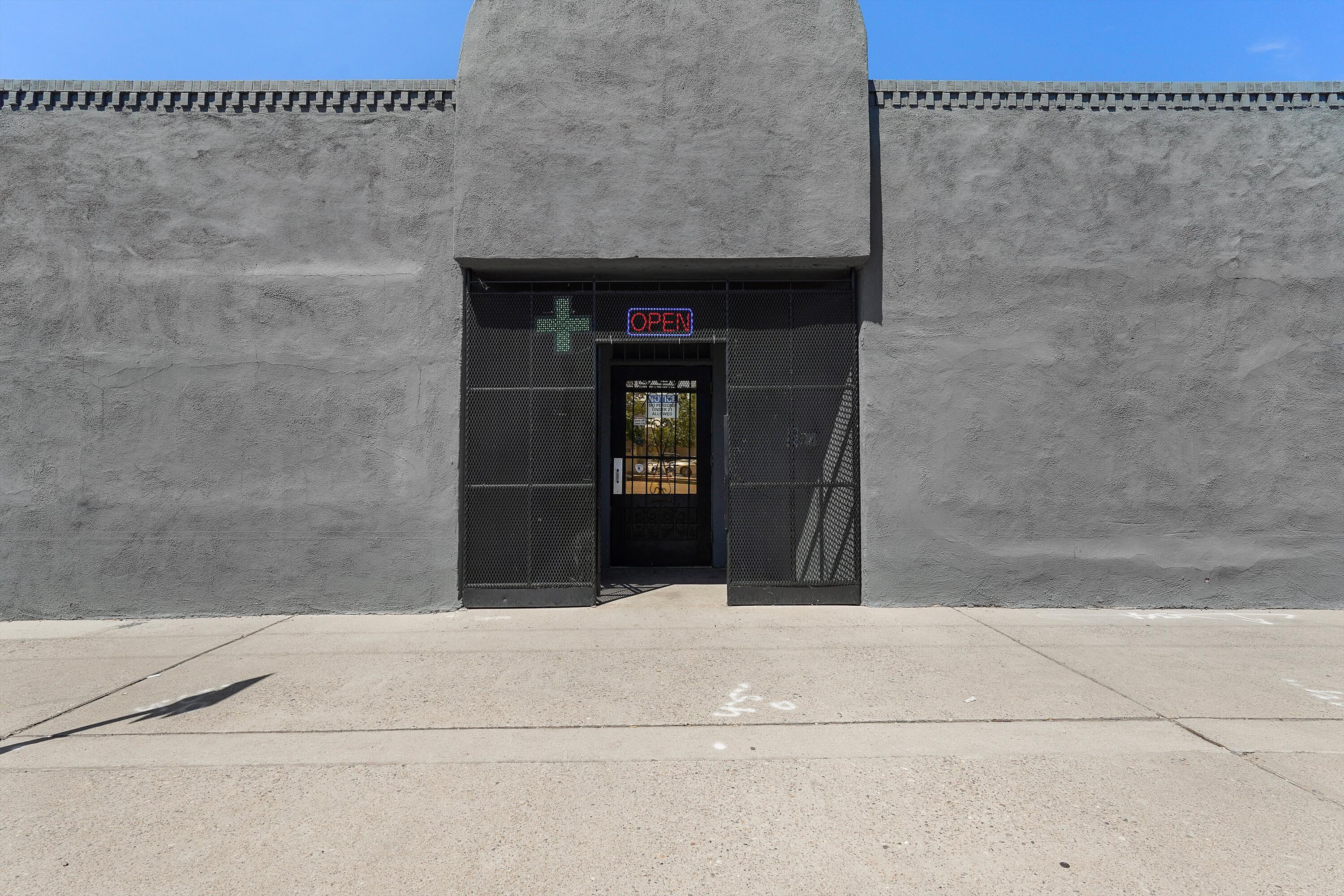 A WORLD OF OPPORTUNITY AWAITS WITH ENDLESS POTENTIAL!  Take advantage of these TWO properties/THREE structures and bring your vision to life.  These MX-L zoned gems include  spacious offices/rooms, storage, a kitchenette, grand display rooms, and a building great for renovating! Whether it's a boutique, cafe, or creative hub, this space offers a canvas ripe for artistic innovation. Imagine transforming the ample square footage into a performing arts space or a film studio. Commercial zoning opens the door to a variety of uses, from retail, to live performances to production hubs. Don't miss out--contact us today to tour this one-of-a-kind property!