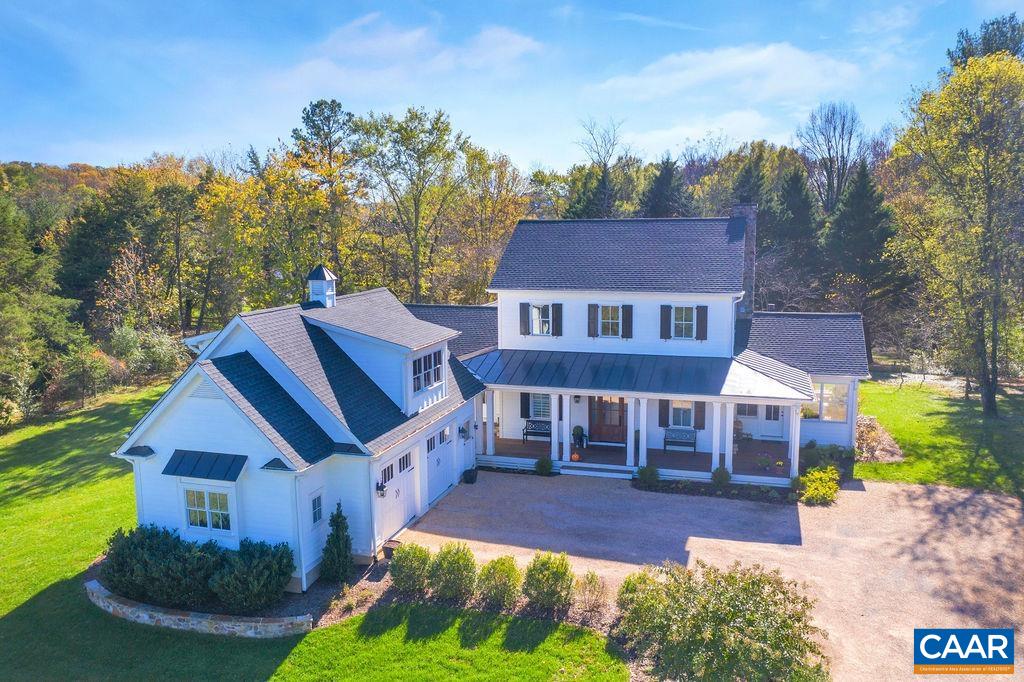 Rare opportunity to build in the heart of Ivy! Custom home with 1st floor primary TO BE BUILT + existing guest cottage on two adjoining parcels totaling 8.25 acres just minutes from UVA, Farmington, and Boar’s Head. The 5.06-acre buildable lot is fairly level and partially fenced - perfectly suited for a custom home with pastoral views, a great yard with a future pool or sport court. Tucked away on the second parcel of 3.19 private acres, a charming 1940s brick bungalow features original hardwood floors, moldings, and mature landscaping - an ideal guest cottage, income-producing rental, or an interim residence while you build your new home. With an unbeatable close-in Ivy location within Murray/Western Alb schools, this property combines immediate livability with long-term investment potential.