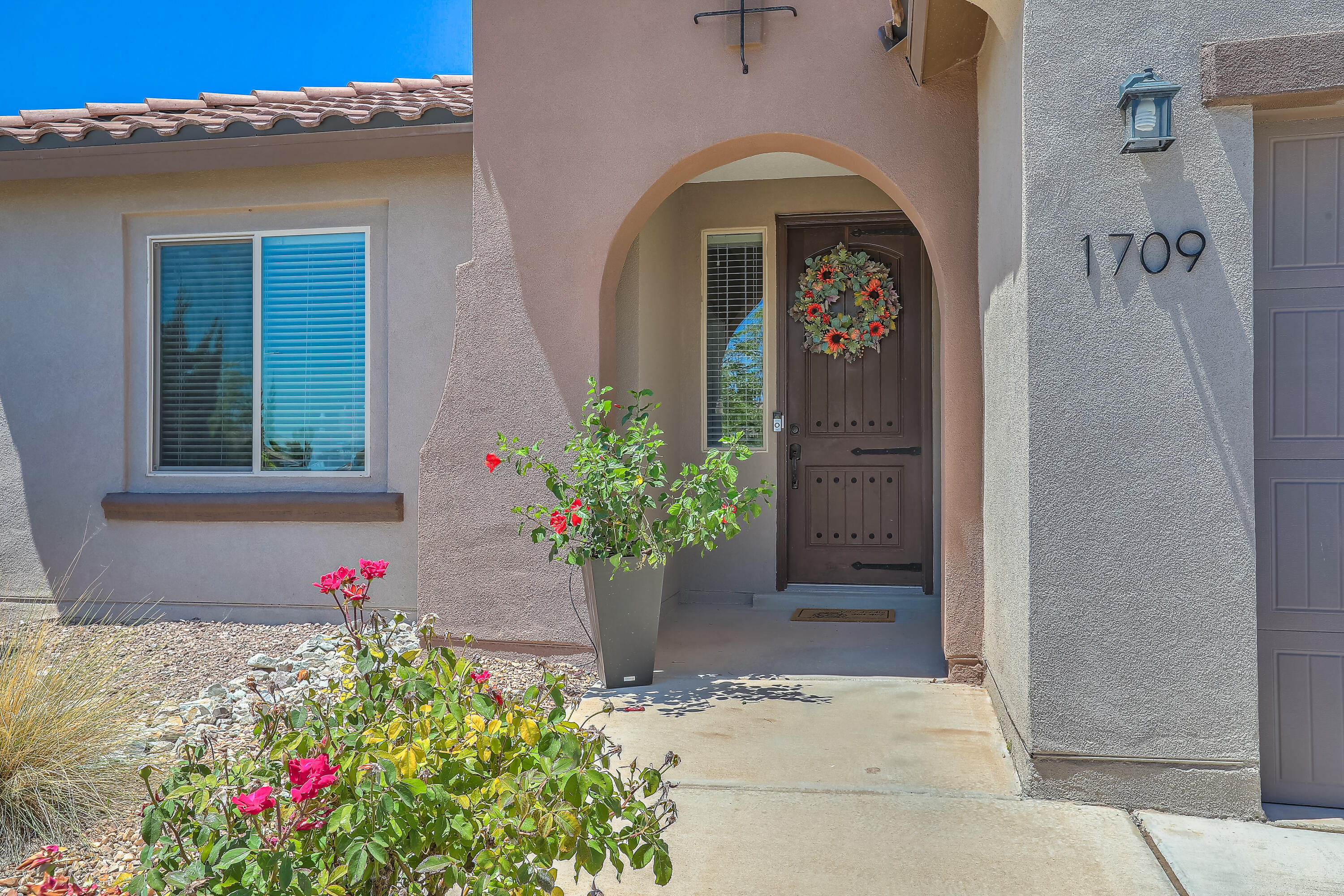 Step into your dream home in the highly coveted Mirehaven subdivision! This stunning Pulte property features an expansive open floor plan that exudes quality craftsmanship and impeccable attention to detail. The chef's kitchen is a culinary paradise, complete with luxurious granite countertops, a spacious center island, stylish tile backsplash, and top-of-the-line stainless steel appliances. With 3 spacious bedrooms plus a dedicated home office, this home has it all! Indulge in the custom walk-in master shower and enjoy the elegance of wood tile flooring throughout. The oversized patio doors seamlessly connect indoor and outdoor living, inviting you to the beautifully landscaped backyard, which is perfect for entertaining or enjoying family fun under the covered patio. Plus,