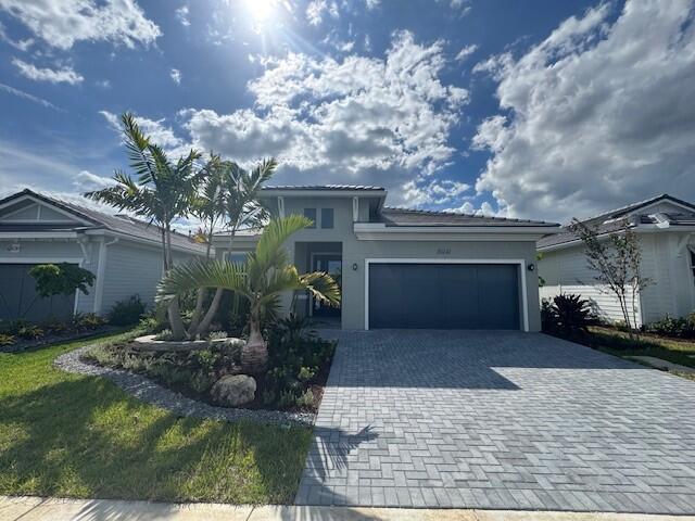 As you step through the front door of this Samantha Boca Raton home, you're immediately greeted by the warm elegance of porcelain tile floors that flow seamlessly throughout the home. The space opens up into a designer appointed kitchen and an expanded family/great room, filled with natural light and designed for both relaxing evenings and lively gatherings. Enjoy a beautiful 21,000+ sq ft clubhouse, where you'll find endless opportunities to stay active, meet neighbors, and enjoy the best of 55+ living.