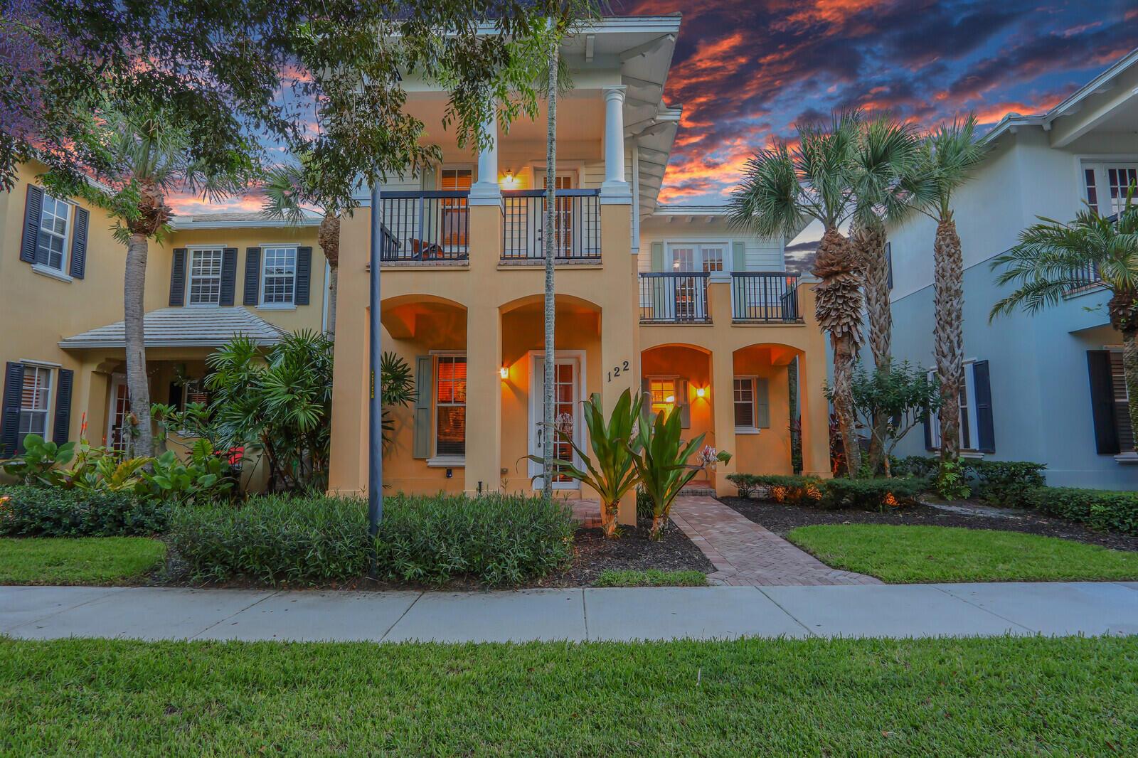 Welcome to this beautifully renovated 3-bedroom, 2.5-bath CBS  home in the highly desirable Botanica community, perfectly situated in the heart of Jupiter. This spacious two-story residence offers nearly 2,200 sq ft of living space (3,500 sq ft total) with an open kitchen with newer stainless-steel appliances, cherry wood flooring, and soaring volume ceilings. The main level includes a versatile den, while all three generously sized bedrooms are located upstairs, all with private balconies. Step outside to your own private courtyard oasis featuring a covered patio, lush landscaping & sparkling swimming pool - ideal for relaxing or entertaining. A detached two-car garage is connected by a covered walkway for added convenience. Botanica offers outstanding amenities including of nature preserve with scenic walking trails. Enjoy unparalleled access to everything Jupiter has to offer walk to Publix, Starbucks, and great local dining, with pristine beaches, A-rated schools, Love Street, Abacoa, FAU, Roger Dean Stadium, I-95, and PBIA just minutes away. Pet-friendly any size welcome!