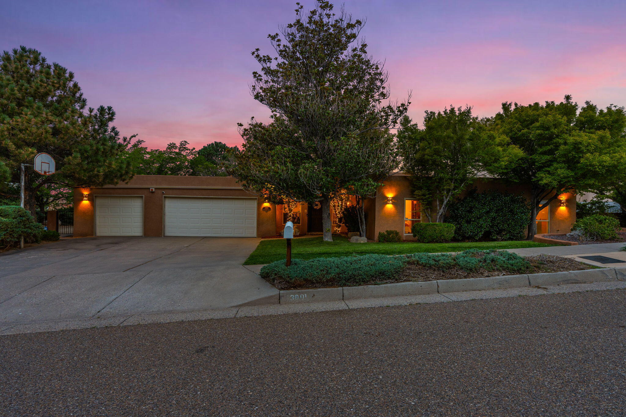 Welcome to this gorgeous Casa Grande Estates home, located on a generous NE Heights foothills cul-de-sac lot of over 0.6 acres. This home offers exceptional city views, providing a serene environment for both relaxation & entertaining, in thoughtfully designed indoor & outdoor living spaces. Recent updates include a newly remodeled kitchen & guest bath (2024), as well as enhancements throughout. With more than 3,900 square feet, 4 bedrooms, 2.5 bathrooms, providing formal & informal living & dining options. See included 'Owner's Improvements' list! Custom atrium offers a tranquil retreat, complete w/ sauna, pond & bridge, sitting area, lush plantings, & skylights. Outdoor amenities include a covered patio, view balcony, & a firepit for cozy gatherings. Close by Foothill trails.