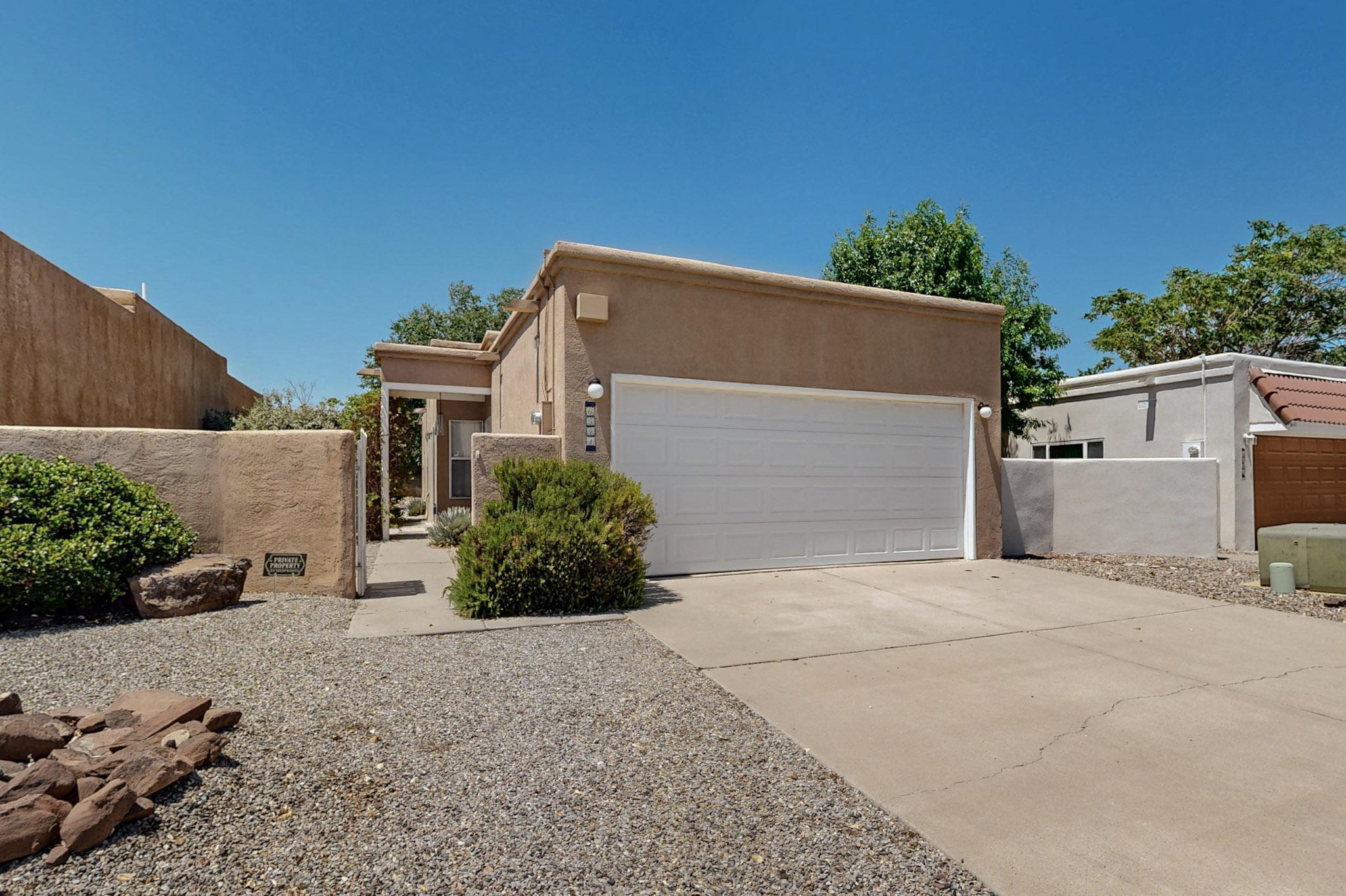Charming 2-bed, 2-bath home with refrigerated air in a convenient NW location! This home features a private courtyard entrance, a cozy gas log fireplace, and low-maintenance landscaping--perfect for easy living. Bright and open with great natural light, ideal for relaxing or entertaining. Single story layout is the perfect size for a new family or someone looking to downsize. Close to schools, stores, restaurants, and walking paths. Don't miss this opportunity!