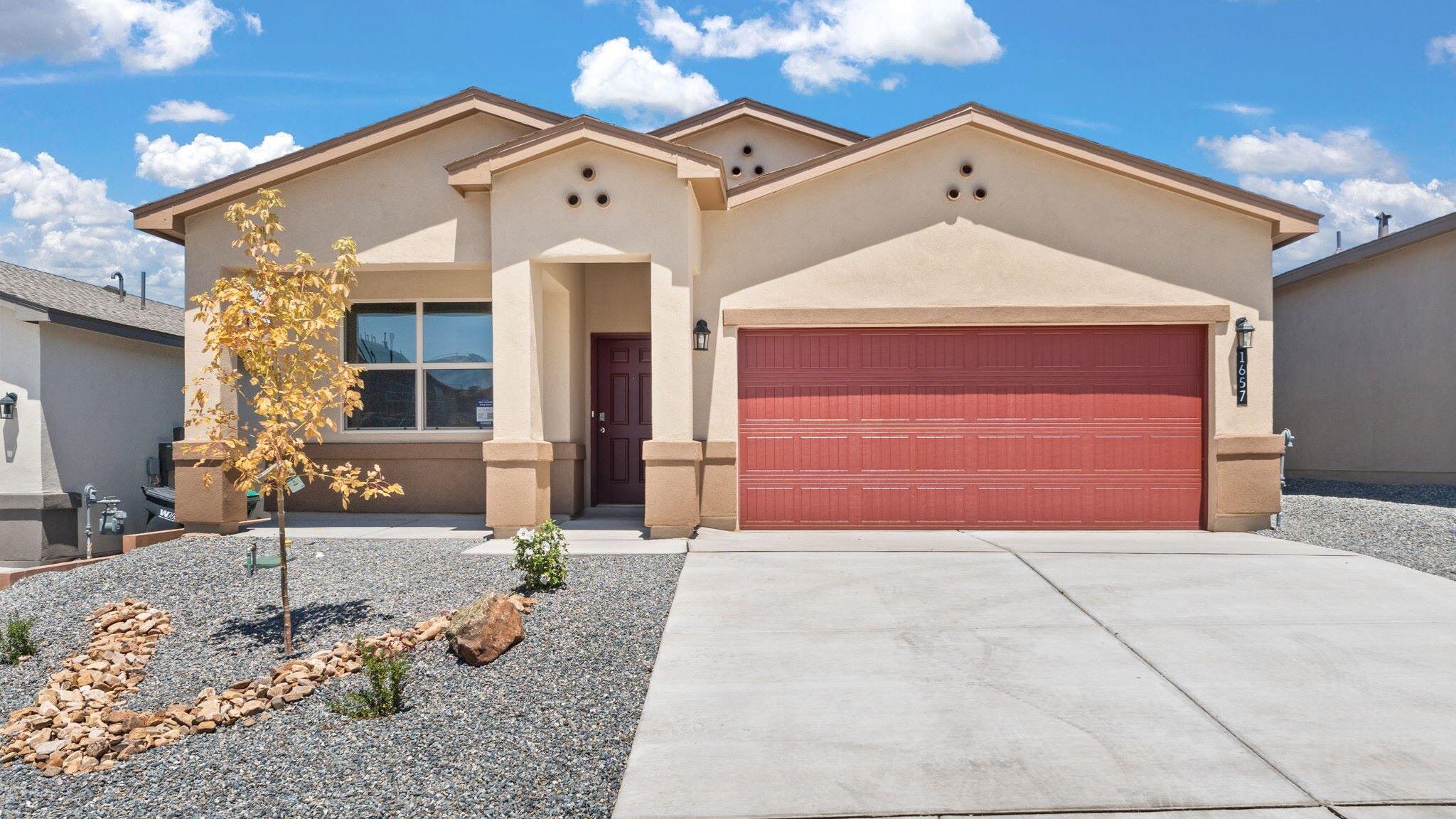 This 1,716 sq ft home offers an open-concept layout with 3 bedrooms and 2 baths. The kitchen features Whirlpool stainless steel appliances, including a microwave, range, and dishwasher. Enjoy a spacious primary bedroom, a covered patio for outdoor living, and a smart home system for added convenience. Stylish, functional, and move-in ready! Modern design, smart features, and plenty of room to live and grow--this home has it all!