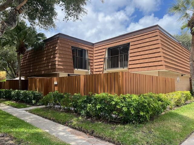 NEWLY RENOVATED & TOTALLY UPDATED BULFFS RIVER TOWNHOME WITH CUSTOM CABINETS, ELEGANT QUARTZ COUNTERS, NEW LIGHT FIXTURES, ALL NEW APPLIANCES, POPCORN REMOVED, FRAMLESS SHOWER, WOOD-LOOK FLOORING THROUGHOUT.  ENJOY SOUTHEAST BREEZES & HUGE PRIVATE PATIO, DESIRABLE COMMUNITY, GREAT LOCATION, STEPS TO OLYMPIC-SIZE SWIMMING POOL, 4 LIGHTED TENNIS COURTS, PICKLEBALL, BASKETBALL.  WALK OR BIKE TO BEACH, SHOPPING, DINING.