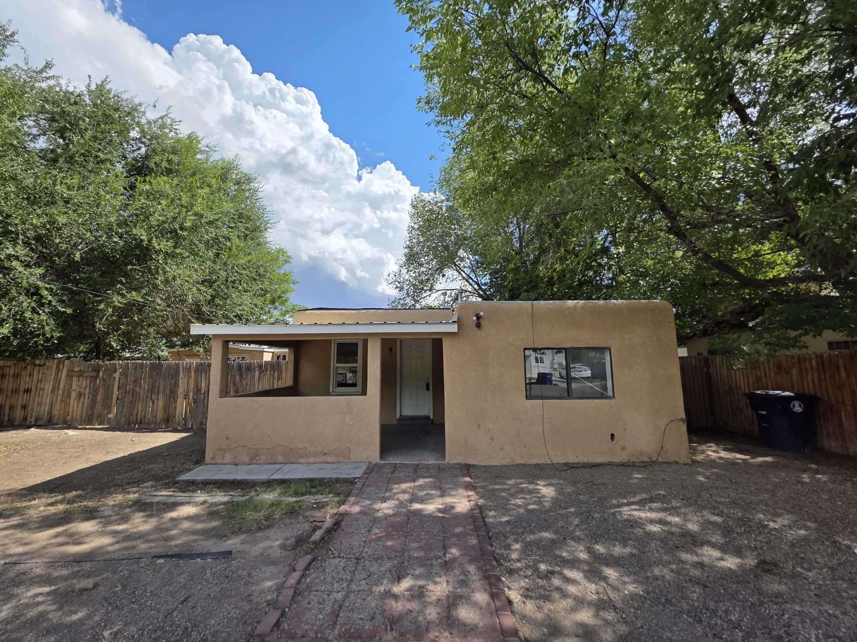 Bring your vision to life with this inviting Northwest Albuquerque home, offering the perfect blend of potential and versatility.  The property includes a separate 231 sq ft studio with its own bathroom -- ideal for guests, an office, or a hobby space. This square footage is not included in the total sq ft.The main living areas provide generous room for gatherings, while the bedrooms offer comfortable, private spaces. Conveniently located near shopping centers, restaurants, parks, and recreational facilities, this home makes everyday living a breeze. Whether you're an investor or a buyer ready to personalize your next home, it delivers functionality, flexibility, and promising potential to make it uniquely yours.