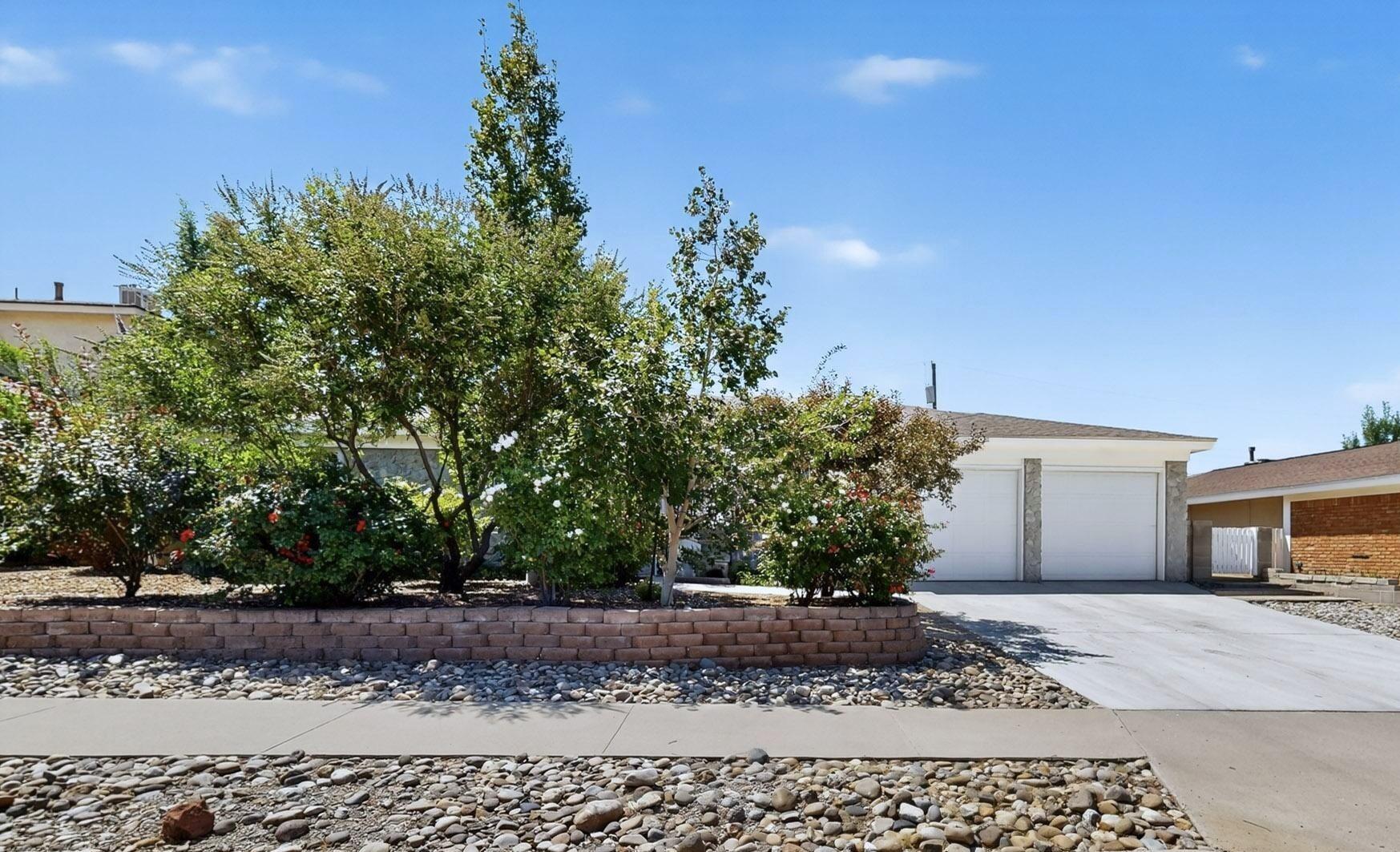 Welcome to this delightful must-see single level home that offers a perfect blend of modern updates & timeless comfort. Tucked away behind a lush wall of mature foliage you will find 4 BR's, 2 1/2 baths, refrigerated air, vinyl windows, plus a covered south facing patio overlooking a peaceful private backyard. The kitchen has been completely transformed and features beautiful cabinetry, gleaming granite & quartz countertops, stone backsplash & high end stainless steel appliances.  All the bathrooms have been redone w/new flooring, fixtures + stone/tile enclosures & counters. The entry, kitchen, halls & den all boast vinyl wood plank flooring.  Vinyl patio doors from the den & PBR both  open onto B/Y patio.  Security wrought  on all windows, doors & front patio enclosure+new roof in 2017