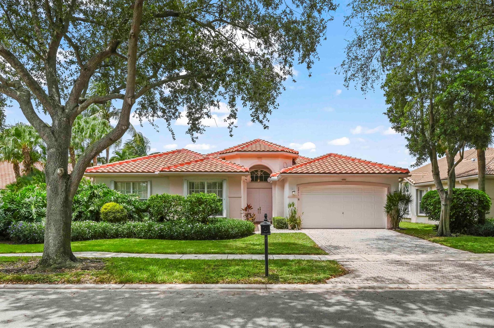 NEW ROOF 2023Presenting 6851 Fiji Circle, a marvelous haven of sumptuous living in the highly sought-after Valencia Isles Community of Boynton Beach, Florida. This elegant property offers a striking blend of modern amenities and serene surroundings, situated with unadulterated views of a resplendent lake setting.Upon approach, the refreshed exterior presents a new roof(2023), enhancing the aesthetic appeal and structural integrity of this remarkable abode. The meticulous landscaping adds a touch of serenity and is framed by the vibrant native flora, contributing to a setting that breathes tranquility daily. Step into a spacious interior that is met with an abundance of natural light filtering through well-placed windows, creating an enchanting atmosphere that permeates the entire living space. The open-plan layout offers room for personalization and accommodates an indulgent sense of spaciousness. The interior atmosphere is further enhanced by the serene backdrop of the eye-arresting lake view, visible from key areas throughout the home, without wavering on privacy.

The residence prides itself in promoting harmonious indoor-outdoor living. Step outside onto a private outdoor space with serene lakefront views that offer an invitation to unwind, ideal for peaceful contemplation or entertaining friends and family alike. Indeed, this property stands out as a sanctuary of peace and contentment, away from the bustle of the everyday life, yet conveniently situated to enjoy community facilities.

Situated within the Valencia Isles Community, the home benefits from access to top-tier amenities, a testament to the well-maintained community, which strives to enhance the quality of life for all its residents. Overall, this house is not just a piece of real estate; it's a lifestyle statement that appreciates the tranquillity of nature while celebrating the joy of community living. Its charm seamlessly blends with the amenities provided, crafting a living experience that is as engaging as it is restful.

With access to a resort-style 55+ clubhouse featuring pools, a fitness center, tennis and pickleball courts, and year-round activities, this home offers not only comfort but a vibrant lifestyle.