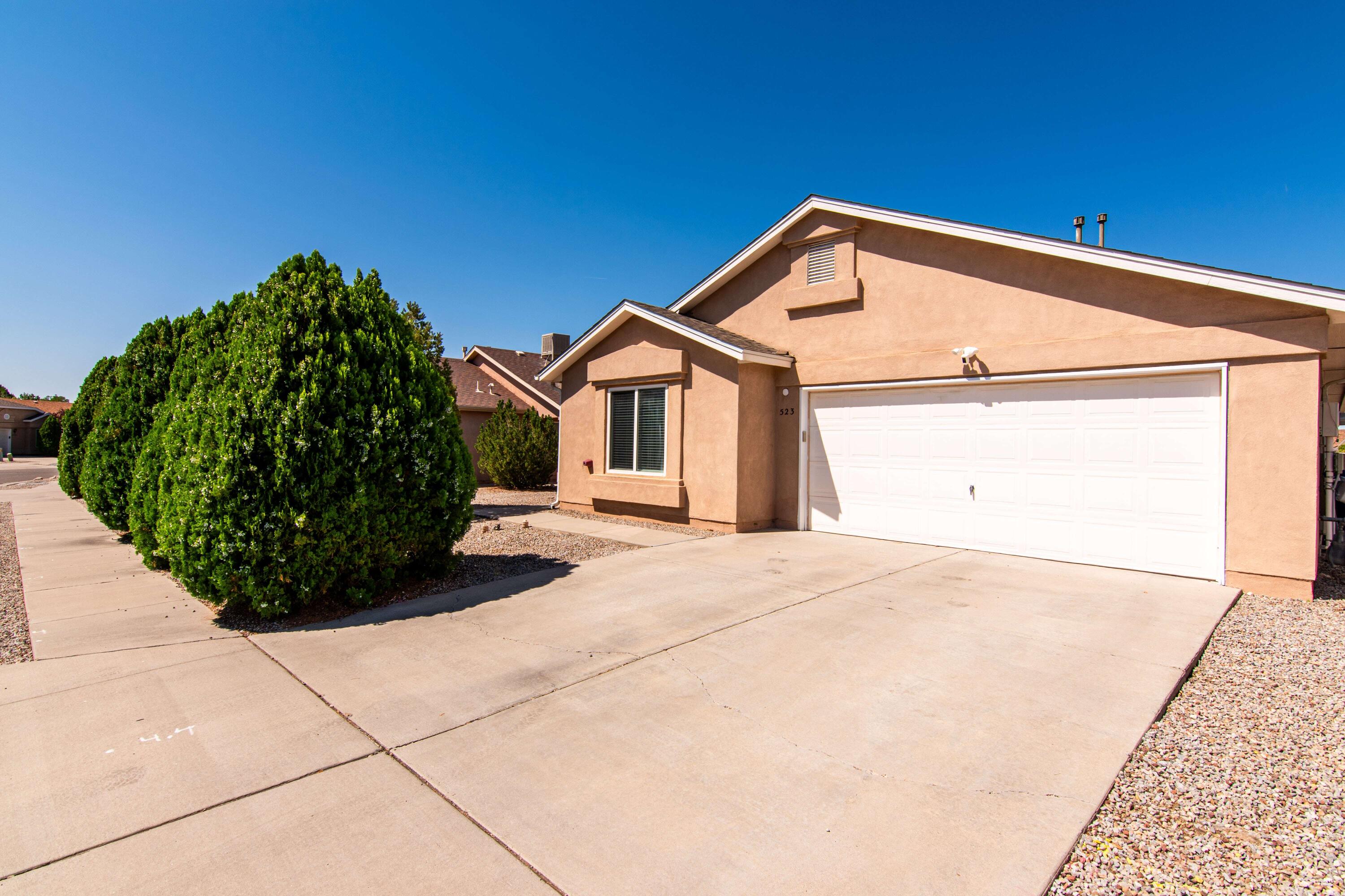 In the sought-after Mirabella neighborhood, this 4-bedroom, 1,549 sq.ft. home features wall-to-wall laminate and tile flooring and a gas log fireplace in the living area. The backyard is set up for outdoor entertainment with a large shade sail, storage unit, and a cinder block wall for added privacy. Enjoy the convenience of being just over a mile from Costco, Home Depot, Chick-Fil-A, Starbucks, Dion's, and other favorite spots, with I-40 only about 5 minutes away.  Bonus:  The white cabinets in the kitchen are included!  Eligible for FHA financing and the First Time Home Buyer Program. Request the 360 degree video.