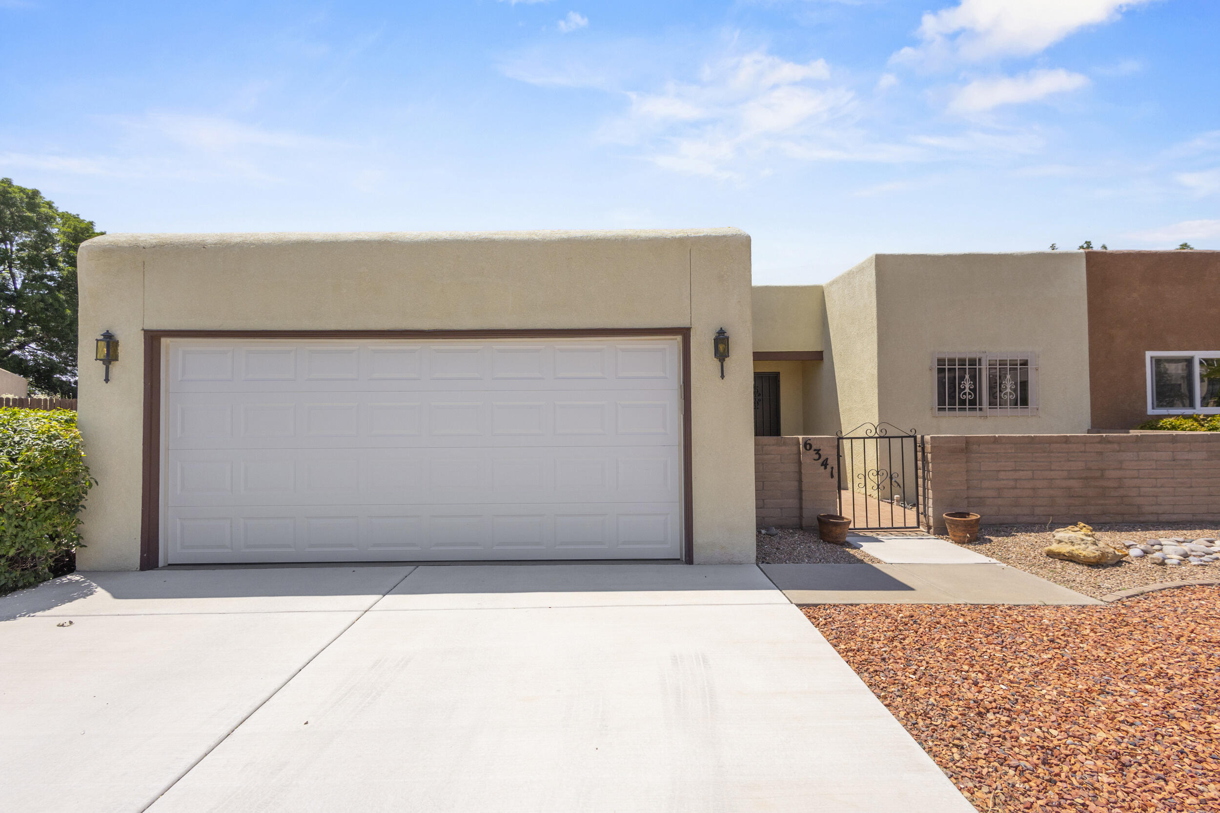 Amazing LOCATION in Academy Hills and the La Cueva school district! NEW ROOF two years ago. REFRIGERATED air! Kitchen features Corian counters and a new dishwasher (1 year).  Large living space with wood laminate flooring and gas-log fireplace. Primary bedroom includes a walk-in closet and shower. Outside you will enjoy a shady covered patio with additional storage and low maintenance backyard with rose bushes and privacy. Sit in the courtyard to enjoy views of the Sandia mountains. Easy access to Academy Hills Park and Mountain Run Shopping Center. This home has been well taken care of and is waiting for new owners!