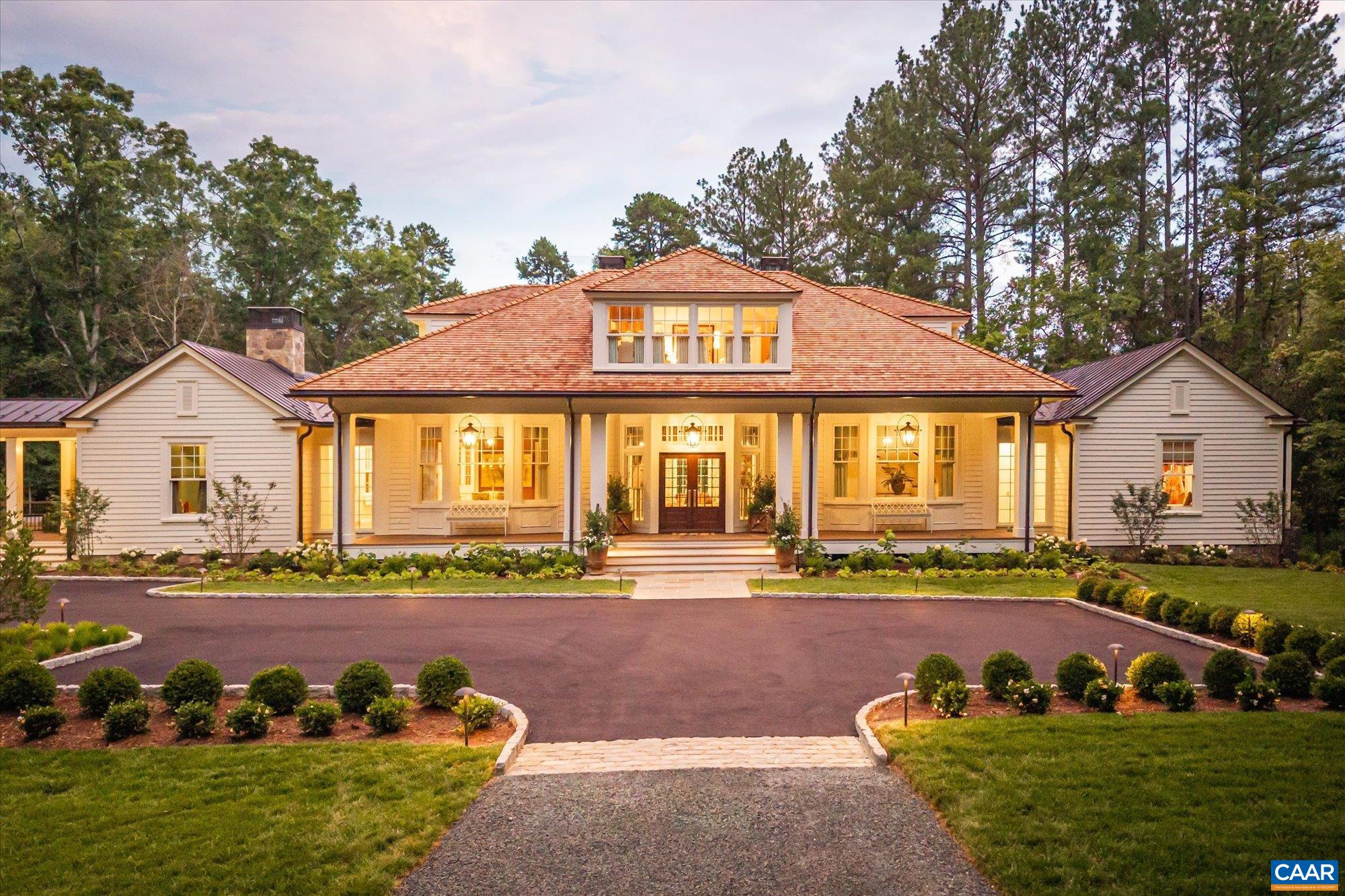 Introducing the 2025 Southern Living Idea House, Keswick Springs. Set on five acres blending manicured gardens with natural beauty in Keswick Estate just outside Charlottesville, this 4,900+ sq ft home offers 4 bedrooms and 4 full-plus-2 half baths, combining traditional Southern architecture with modern livability.  Light-filled interiors include a refined dining room, library, chef’s kitchen with scullery and wet bar, and multiple spaces for entertaining. The primary suite is a private retreat, while additional bedrooms and a snug studio offer flexibility for guests or work. Custom wallpaper, artisan-crafted millwork, and expansive windows frame garden and water views.  Outdoor living features deep porches, a screened porch, and terraces overlooking native plantings, kitchen gardens, fruit trees, and a tranquil lake.  Within Keswick Estate, owners have the option to join the Keswick Club, offering Pete Dye’s Full Cry championship golf course, an adults-only infinity-edge pool, tennis courts, fitness center, spa, and dining at Marigold by Jean-Georges. Enjoy a rare blend of timeless design, resort-style amenities, and a serene natural setting in one of Virginia’s most prestigious communities.