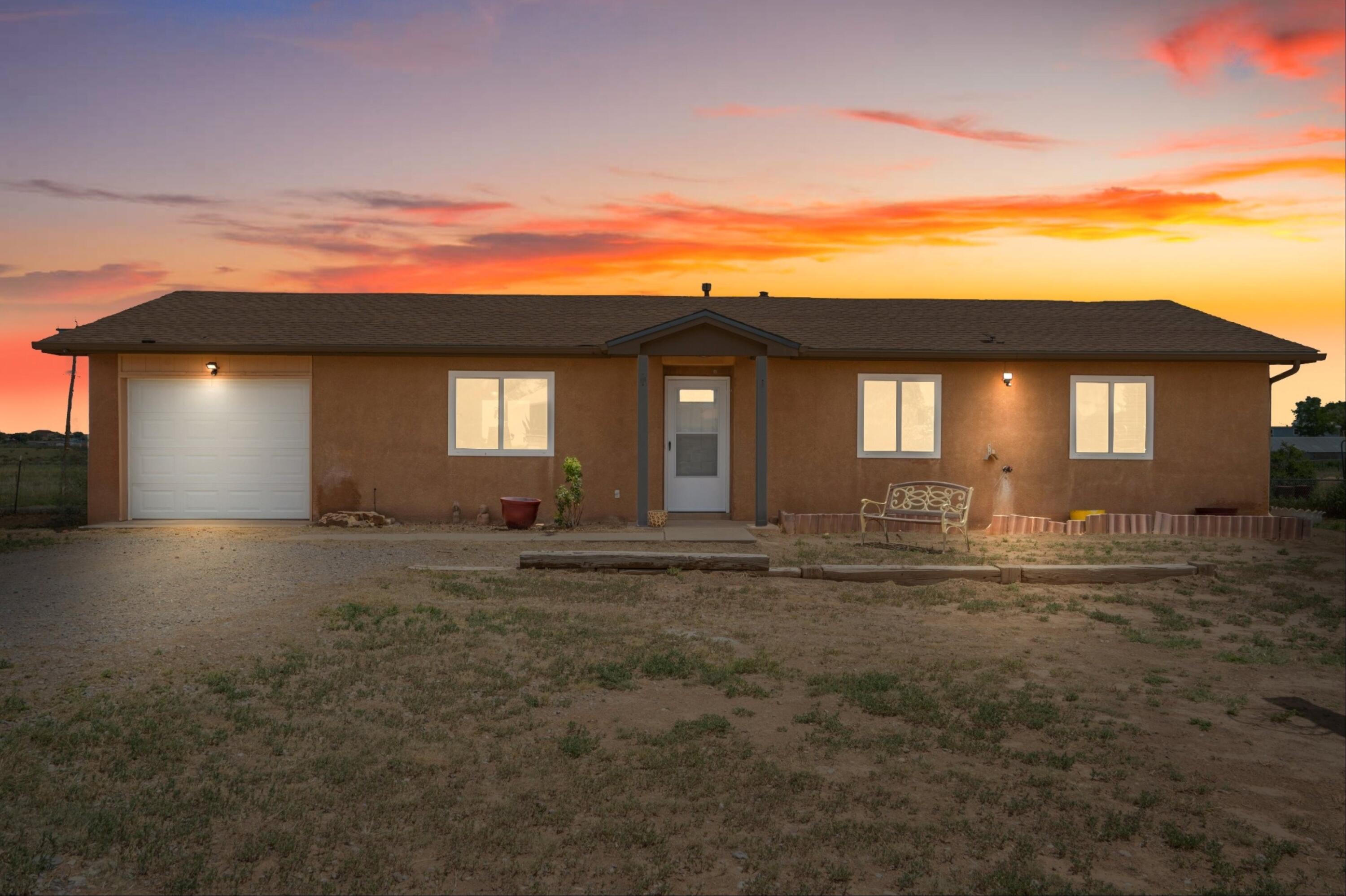 Freshly renovated and move-in ready, this charming home offers the perfect blend of comfort and functionality. Sitting on just over an acre of mostly fenced, level land, there's plenty of room for your toys, animals, or the workshop you've always dreamed of. Inside, the home is spotless and thoughtfully updated, featuring modern finishes and the comfort of refrigerated air to keep you cool year-round.  Located in beautiful Edgewood, you'll enjoy the peaceful feel of rural living with easy access to shopping, dining, and schools, plus a quick commute to Albuquerque or Santa Fe via I-40. Whether you're looking for space to spread out or simply a quiet retreat, this property is ready to welcome you home.