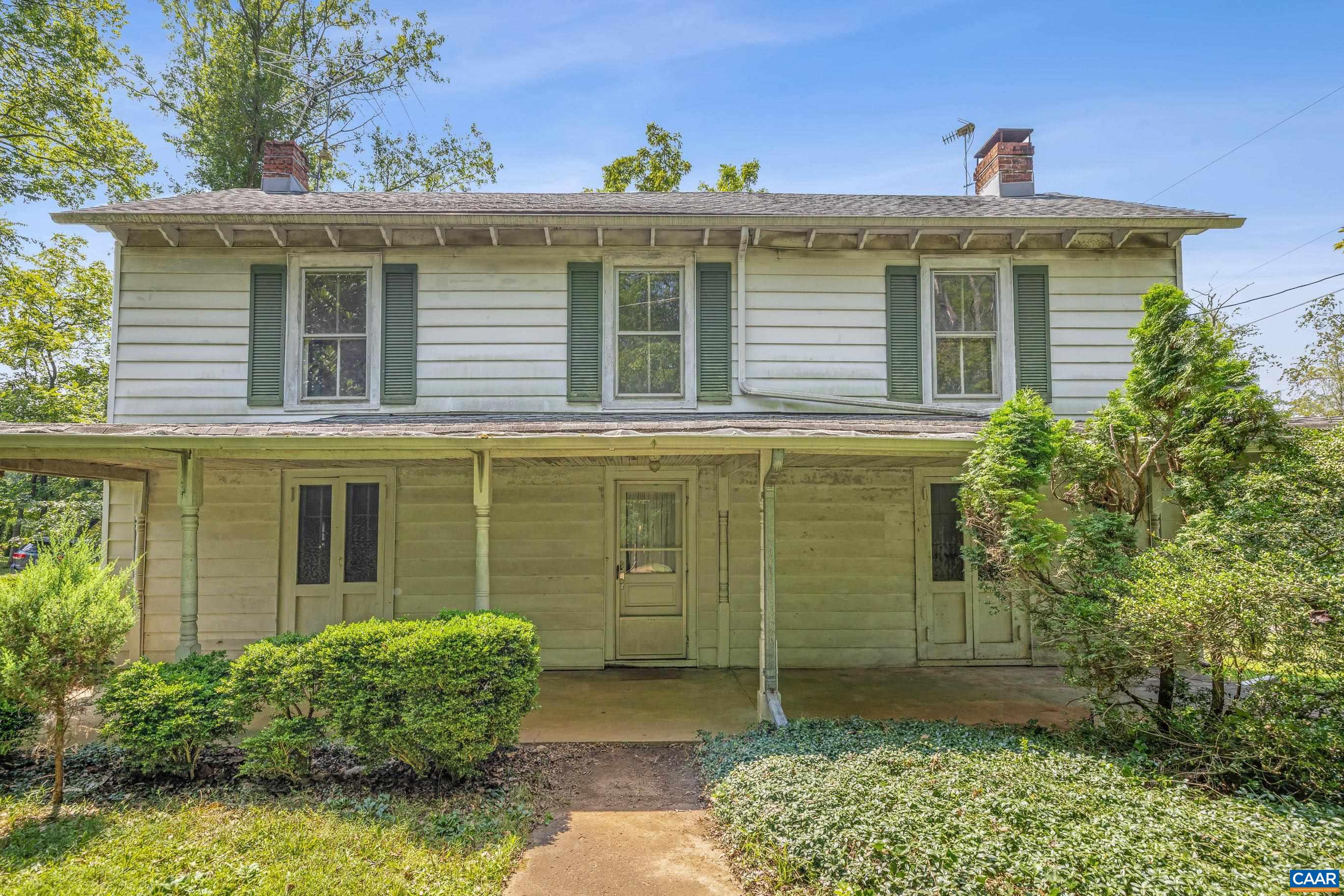 Bring Your Vision to Life at 2370 Proffit Rd! Step back in time with this charming 1800's farmhouse brimming with character and history, ready for someone to restore it to its full glory. Featuring 3 bedrooms, 1.5 bathrooms, and original hardwood and pine floors, this home sits on a .6-acre lot filled with mature boxwoods and a peaceful, green yard perfect for enjoying the outdoors. Inside, you'll find inviting living and family rooms - each with the original wooden French doors leading to the front porch - offering the kind of character you just can't find in newer homes. A sun-filled upstairs room adds to the home's charm and versatility.  Outside, you’ll find a unique garage that once served as the community’s general store in the 1800s - a nod to the property’s rich past. The back garage, currently a recording studio, invites you to dream big and reimagine the space to suit your needs. If you’ve been searching for a true fixer-upper with great history and charm, this is your chance. Come bring your creative eye and breathe new life into this beautiful property.. your farmhouse revival awaits! Property being sold AS IS, WHERE IS. Perfect for investors or buyers looking for a renovation project. OPEN HOUSE SUNDAY 8/17 1-3PM