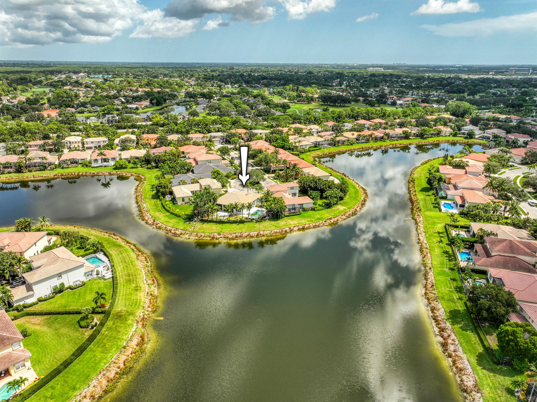 Best Lot in Mirabella!  Tucked at the end of a quiet cul-de-sac, this beautifully maintained one-story CBS home blends comfort, privacy, and Florida charm. Offering 4 bedrooms, 2.5 baths, and a 2-car garage across 2,695 sq ft on an oversized 11,761 sq ft lot, the home is enhanced with a whole-house gas generator and storm protection including electric and accordion shutters. Step inside to a bright, open living room featuring stone-look ceramic tile and a wall of sliding glass doors framing serene backyard views. The formal dining room is tucked into a cozy corner with a sweeping curved window and ample wall space, perfect for hosting memorable gatherings. The spacious kitchen is designed for both function and style, with a large island featuring pull-up seating, a coffee/wine bar niche, creates the perfect setting for relaxation and entertaining without obstructing the view. This is the Florida lifestyle at its best, private, peaceful, and perfectly appointed. Stay tuned, this inviting lakefront retreat is coming to market soon!