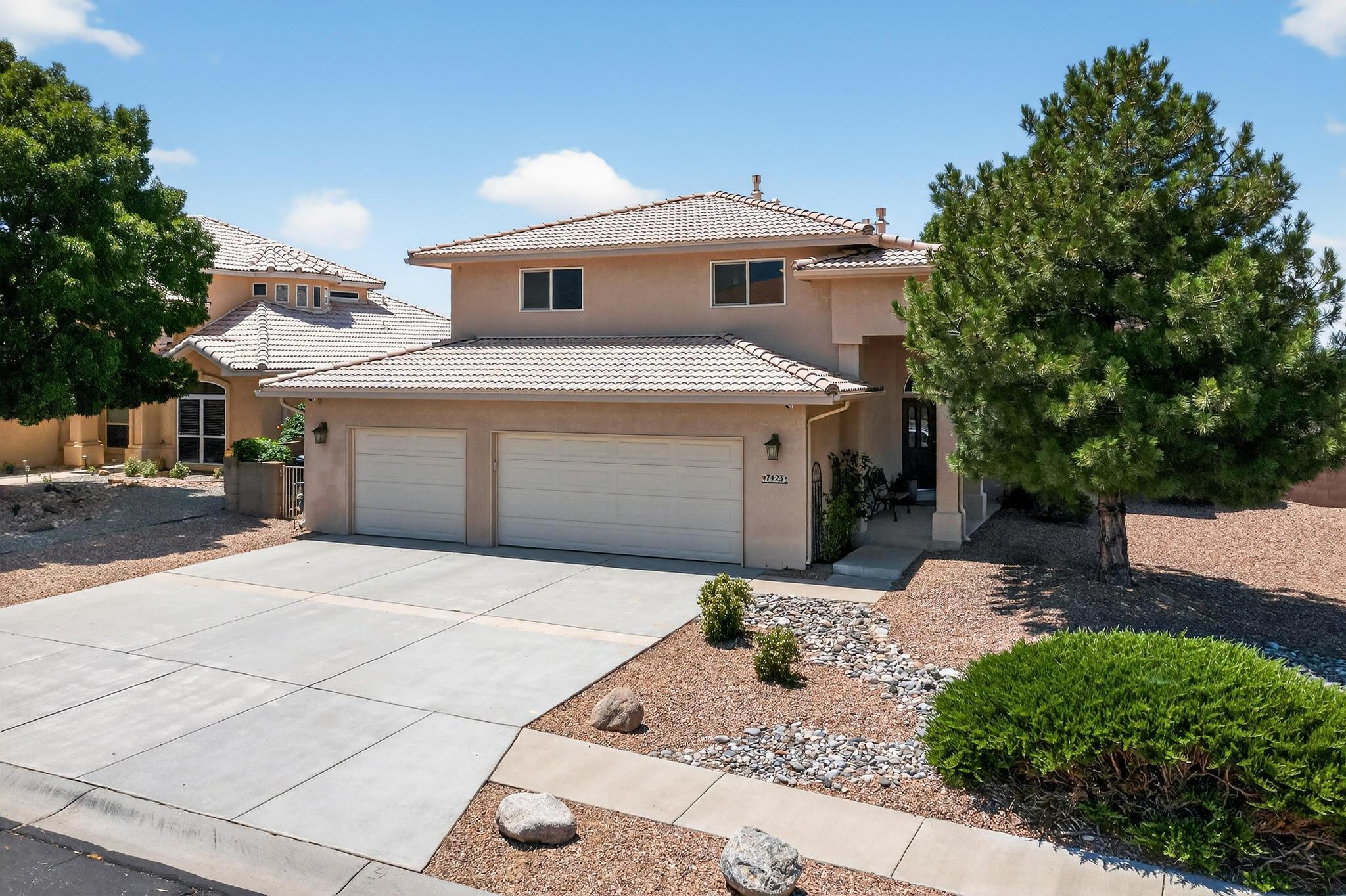 Nestled in the highly sought-after Quintessence subdivision in Albuquerque's Far Northeast Heights, this meticulously maintained 4-bedroom, 3-bathroom home offers 2,789 square feet of refined living space, a spacious 3-car garage, and a recent conversion to refrigerated air with two AC units and two heating units for year-round comfort. Inside, the fully remodeled kitchen is a chef's dream, featuring abundant high-end cabinetry, elegant quartz countertops, and a premium commercial-grade appliance package--all Energy Star rated, including a 27'' Advantium Micro/Convection Oven. Recessed lighting with dimmer switches sets the perfect ambiance, with a stylish tile backsplash and tile flooring. A built-in Samsung Picture Frame TV in a custom cabinet offers a seamless blend of