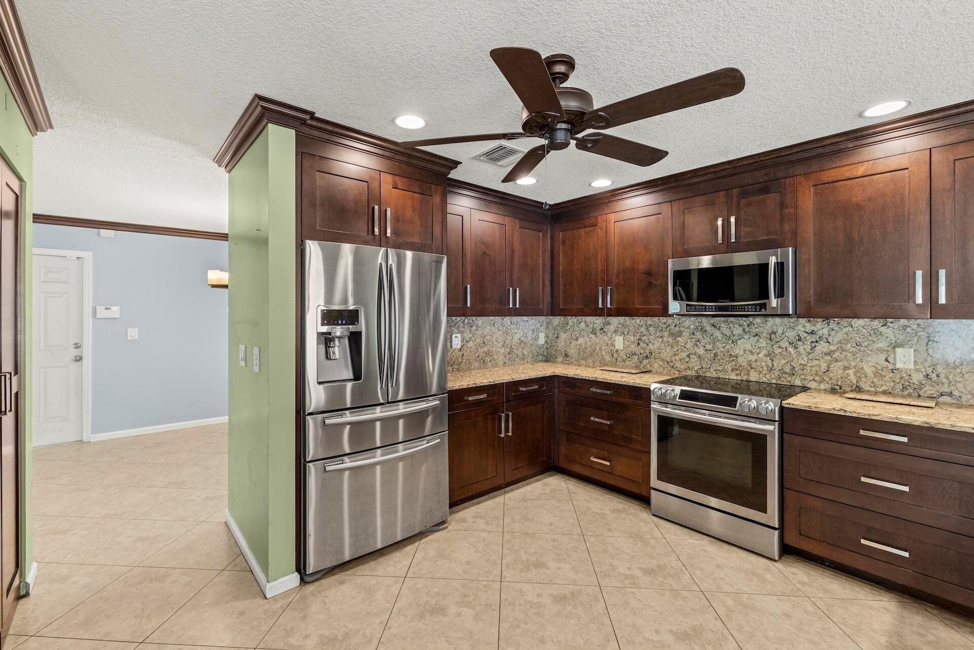 Photo 10 of home located at 6556 Adriatic Way, Greenacres FL