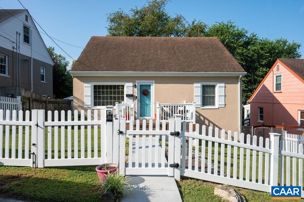 This is a storybook home behind a white picket fence! Charming and updated 1.5-story stucco home just minutes from downtown. Built in 1949, this property blends vintage charm and solid construction with modern upgrades, including a new roof (2020), new insulation, energy-efficient windows, updated plumbing, and a new front porch. The home sits on a fully fenced lot perfect for pets or small children to play safely. Inside, you’ll find a bright and sunny interior, large kitchen, updated bath, real hardwood floors (recently refinished), and new thermal windows. Enjoy outdoor relaxing and dining on the rear deck. The unfinished basement is clean and dry and offers excellent storage space or the potential to make more finished space. Located on a quiet dead end street in an established neighborhood close to downtown entertainment, shopping at 5th Street Station, and only 4 blocks from Belmont Park. Walk to the Mall in 20 mins, the IX Farmers Market in 15 mins, or catch the City bus --it's only 3 blocks to the nearest bus stop.  This home offers the perfect mix of comfort, character, and convenience. Don’t miss this opportunity for an affordable city home.