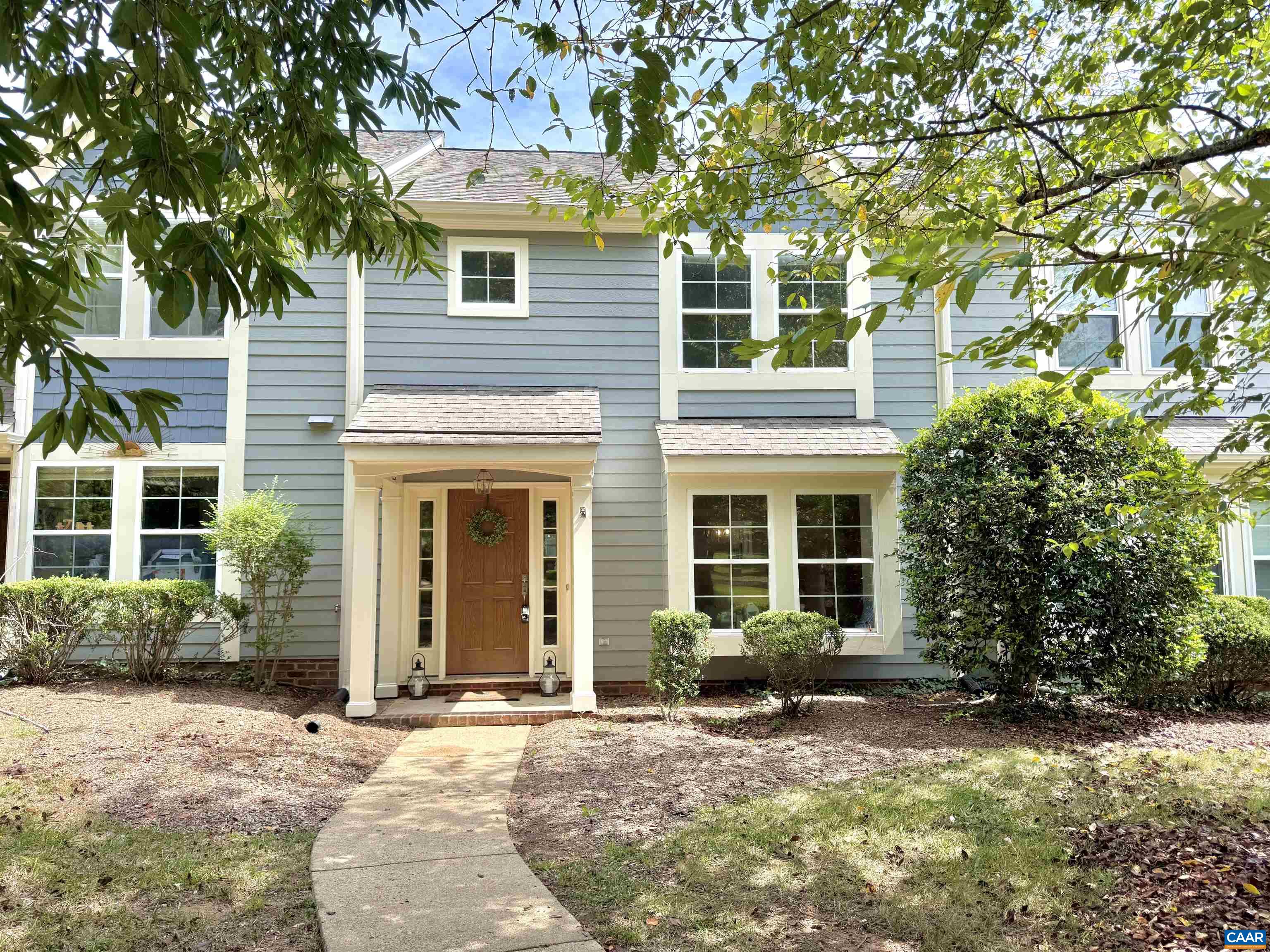 Open Saturday 9/6 from 2-4. Lots of recent improvements to this 3 BR Forest Lakes townhouse: all new plumbing, new LVP flooring and fresh paint throughout the main level, updated fixtures and hardware plus new range and dishwasher. This spacious home has an extra large living room with a box bay window, formal dining room with pass through to the kitchen, a cozy den with a gas fireplace and built in bookcase adjoining the kitchen featuring tile floor and large bay window overlooking the private rear patio. Vaulted ceilings in all 3 bedrooms and even in the hallway make it feel extra spacious and light filled from the staircase skylight.  TheHOA fee includes ALL EXTERIOR MAINTENANCE so you'll never have to worry about budgeting for a roof, siding repairs, or doing yard work. Plus Forest Lakes has more amenities than any neighborhood in the area and includes 2 pools, fully equipped fitness center, tennis and pickleball courts, miles of paved walking trails, athletic fields, basketball court, fishing lakes and more. You'll love coming home to Gateway Village in Forest Lakes, within walking distance to shops, restaurants and neighborhood amenities! Bonus 1 year home warranty from AHS is included for the new owner!