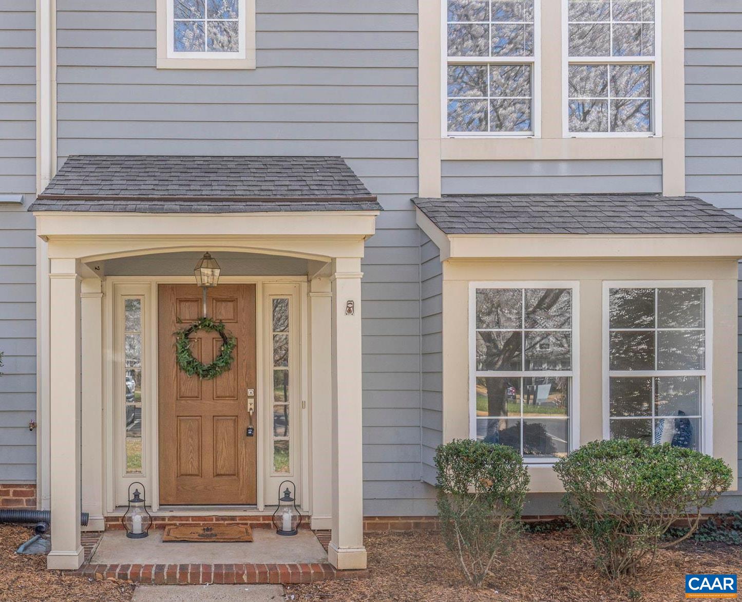 NEW PRICE! Lots of recent improvements to this 3 BR 2.5 BA Forest Lakes townhouse: all new plumbing, new LVP flooring and paint throughout the main level, updated fixtures & hardware plus new range and dishwasher. Extra large living room with a box bay window, formal dining room with pass through to the kitchen, a cozy den with a gas fireplace and built in bookcase adjoining the kitchen featuring tile floor and large bay window overlooking the private rear patio. Vaulted ceilings in all 3 bedrooms and even in the hallway make it feel extra spacious and light filled from the staircase skylight.  HOA fee includes ALL EXTERIOR MAINTENANCE so you'll never have to worry about budgeting for a roof, siding repairs, or doing yard work. Plus Forest Lakes has more amenities than any neighborhood in the area and includes 2 pools, fully equipped fitness center, tennis and pickleball courts, miles of paved walking trails, athletic fields, basketball court, fishing lakes and more. You'll love coming home to Gateway Village in Forest Lakes, within walking distance to shops, restaurants and neighborhood amenities! Bonus 1 year home warranty from AHS is included for the new owner!
