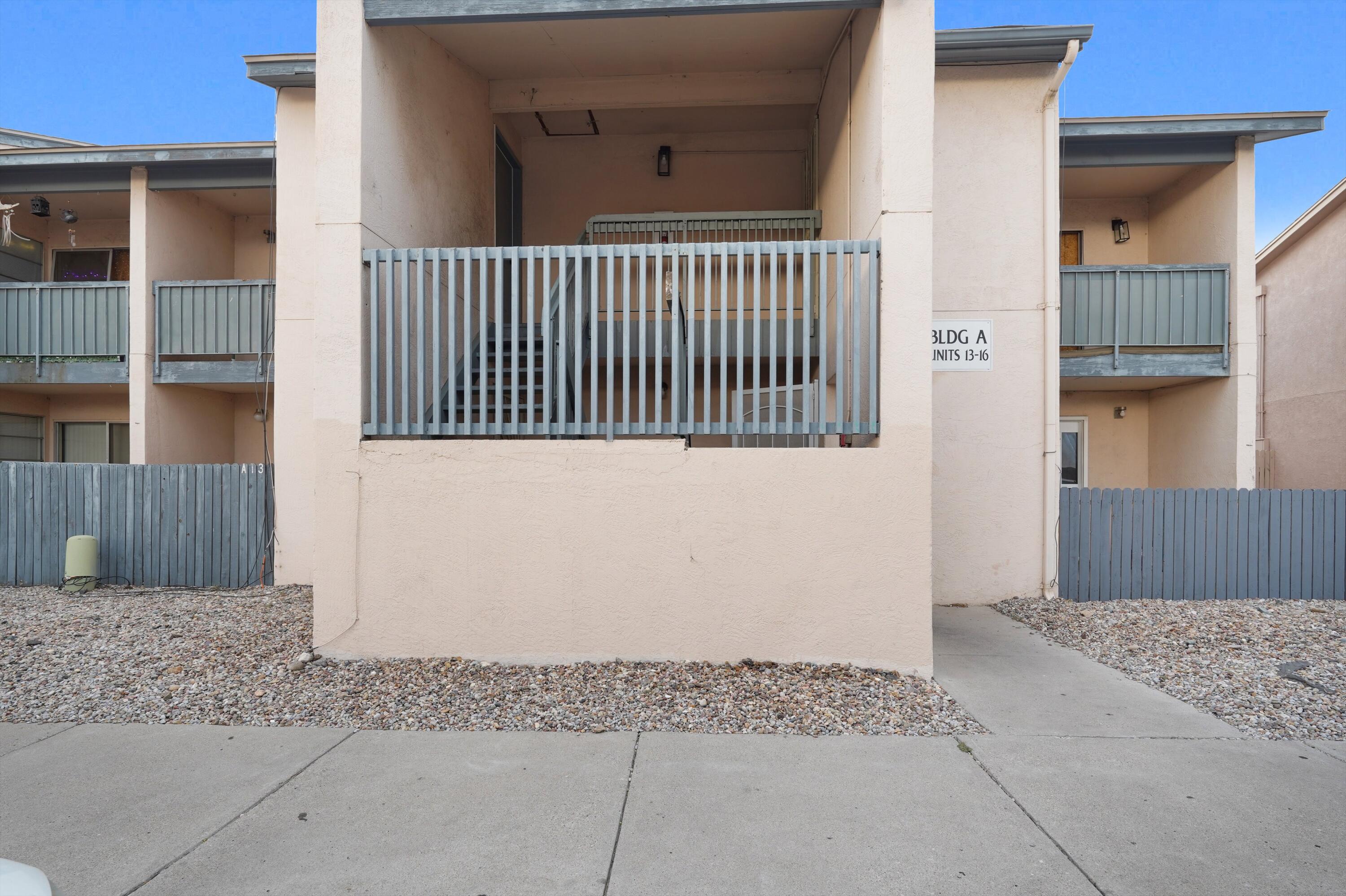 Welcome to a charming second-floor condo in the heart of NE Heights, where natural light, wood-look  floors create a warm, inviting space. The galley kitchen offers functional layout and ample storage, while a private balcony provides a peaceful spot to unwind. Enjoy refrigerated air, central heating, and access to community amenities. Located near Montgomery Plaza, parks, and I-25, this well-maintained gem blends comfort, convenience, and character--perfect for those seeking a cozy retreat or smart investment.