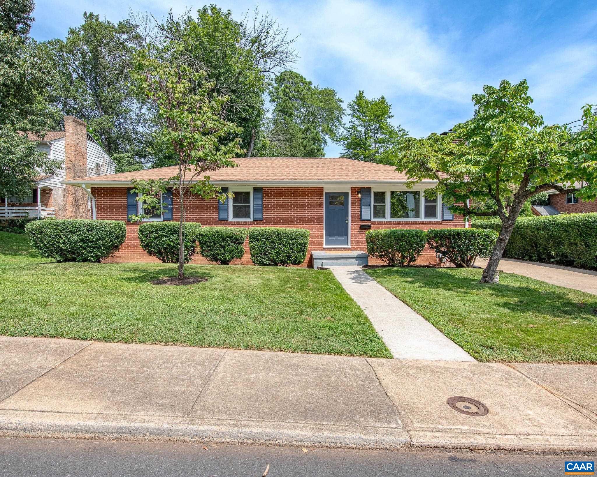 Beautifully Renovated Home in Prime Charlottesville Location! Welcome to this stunning brick ranch in the highly sought-after Rose Hill neighborhood just minutes from downtown Charlottesville, UVA, and some of the area’s best entertainment. Every inch of this home has been thoughtfully renovated, blending modern style with timeless charm. Inside, you’ll find refinished original hardwood floors, fresh paint, and stylish new fixtures throughout. The light-filled kitchen features Taj Mahal quartzite counters, a quartz farmhouse sink, and new cabinetry—perfect for both everyday living and entertaining. The hall bath has been completely refreshed with new tile floors and a floor-to-ceiling tiled bath/shower combo, while the expanded primary bath now includes a gorgeous walk-in shower. Enjoy cozy evenings on the newly redone screened porch with elegant Virginia bluestone, or spread out in the finished basement with hardwood floors—ideal for a home office, media room, or guest space. Original details, like charming pocket doors, have been preserved, giving the home a character that blends seamlessly with its fresh, modern upgrades. This move-in ready gem offers the perfect combination of location, style, and functionality! Owner/agent.