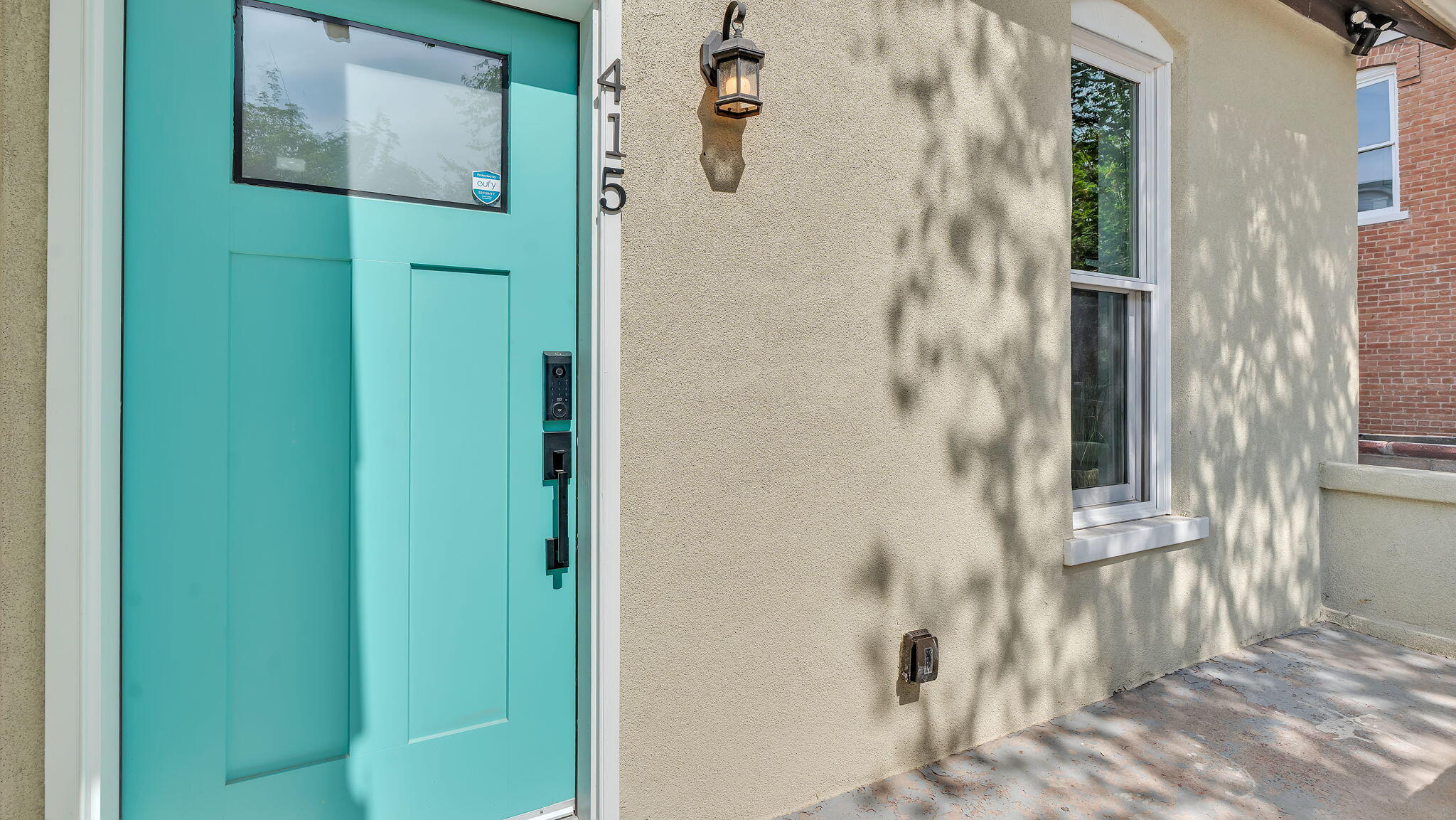 Welcome to this beautifully renovated bungalow in the historic Huning Highland District! This home features 2 spacious bedrooms, 2 bathrooms, with an eye-catching exterior including upgraded stucco, newer roof, a teal front door, and a cozy porch surrounded by landscaped grounds with gated front and backyard. Inside, enjoy a foyer, high ceilings, luxury vinyl flooring, double pane windows, bold baseboards and a modern kitchen with white shaker cabinets, stainless steel appliances, quartz countertops, and a pantry. 3/4 Bathroom boasts a subway tiled shower, pedestal sink, gold hardware, stylish mirrors and wallpaper with a vibrant half bath. Refrigerated air and upgraded electrical and plumbing systems. Large backyard with city views, including ability to build ADU with backyard access!