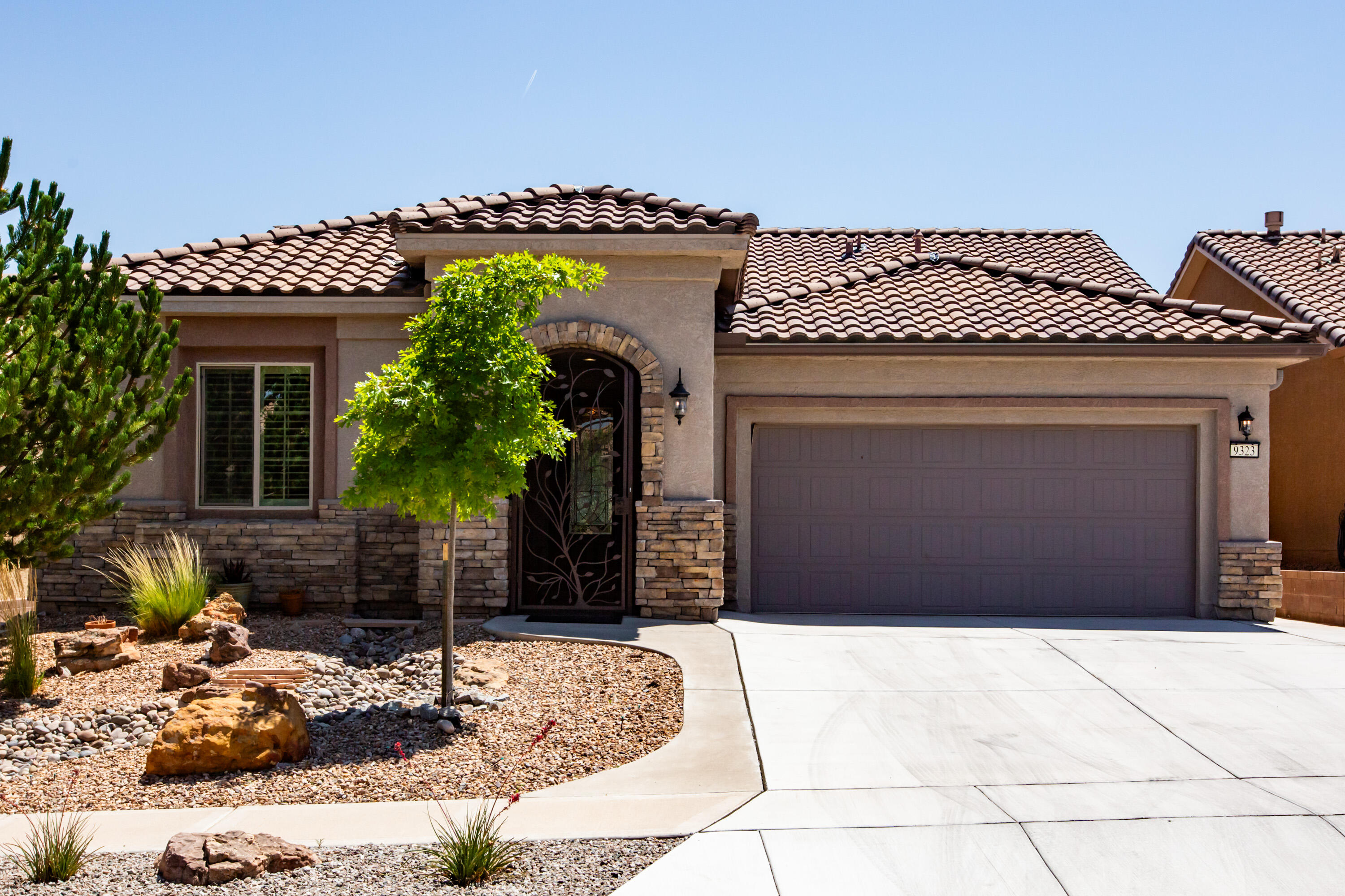 Welcome to Your Dream Retreat Nestled within the Prestigious 55+ Gated Community of Del Webb Mirehaven! This Exquisite Home sits on a Stunning View Lot & was Updated in 2022 with over $60K worth of Stylish Features which include: Gorgeous Hardwood Flooring, Complimented by Nice Carpet in BR's, Custom Gas Fireplace w/Shelving & Cabinetry in the Living Room, Quartz Countertops, Sink & Faucet, Outdoor Kitchen w/Stacked Stone, Kitchen Aid Induction Cooktop, KA Microwave/Oven Wall Unit & Range Hood, Extended Patio w/Pavers,  Gas lines installed for New Living Room Fireplace, Outdoor Kitchen & Firepit!  The home also has Beautiful Custom Courtyard Gate & Stacked Stone Veneer.  French Chandelier from 1915 Stays!  You'll love the Amazing Views from the LR, DR, Kitchen & PBR!! See More section!