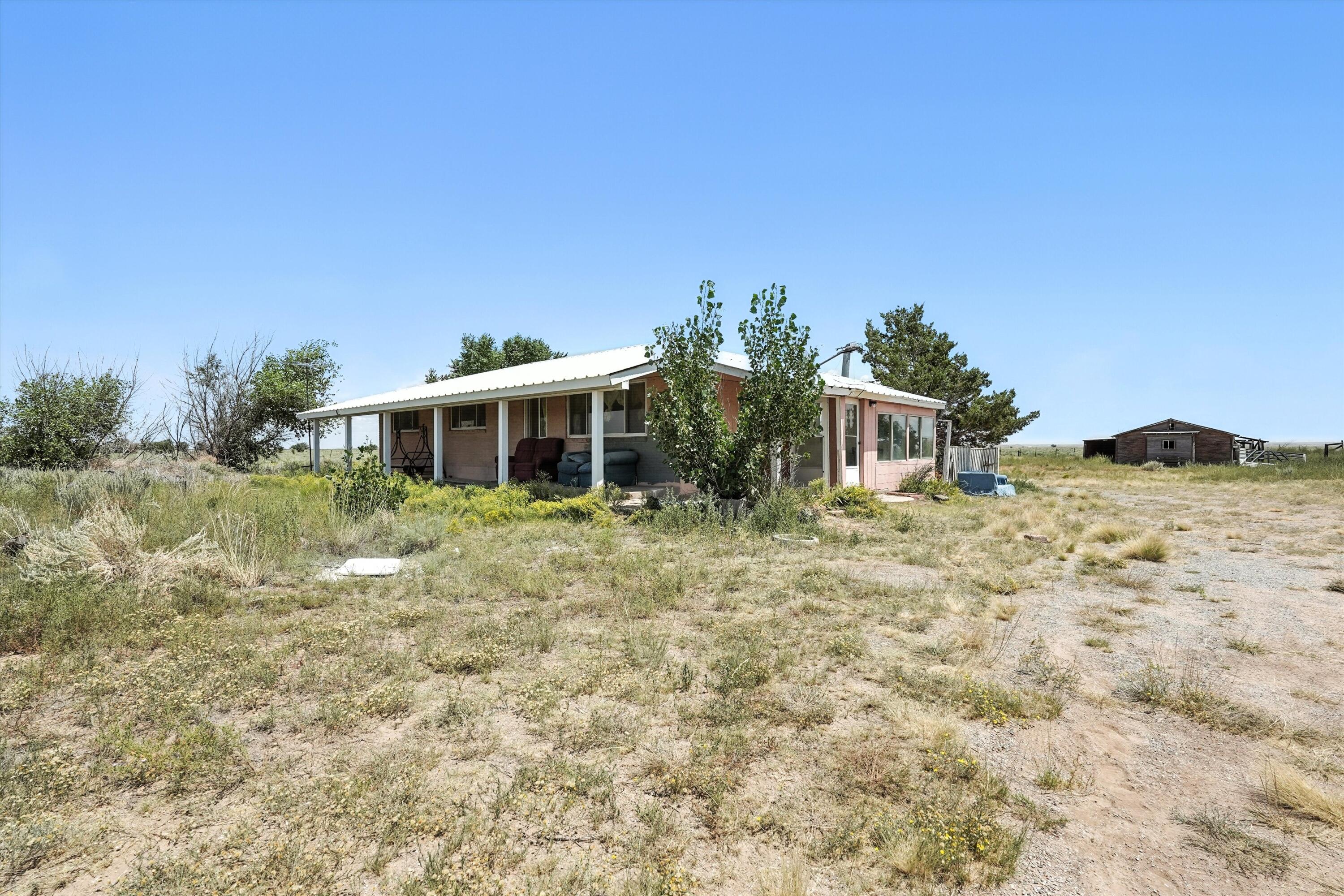 Renovated and move in ready home. Experience the peace of small-town living with this beautifully updated home on 20 acres in Torrance County. Featuring 3 bedrooms, 3 bathrooms, this home blends modern upgrades with country charm.