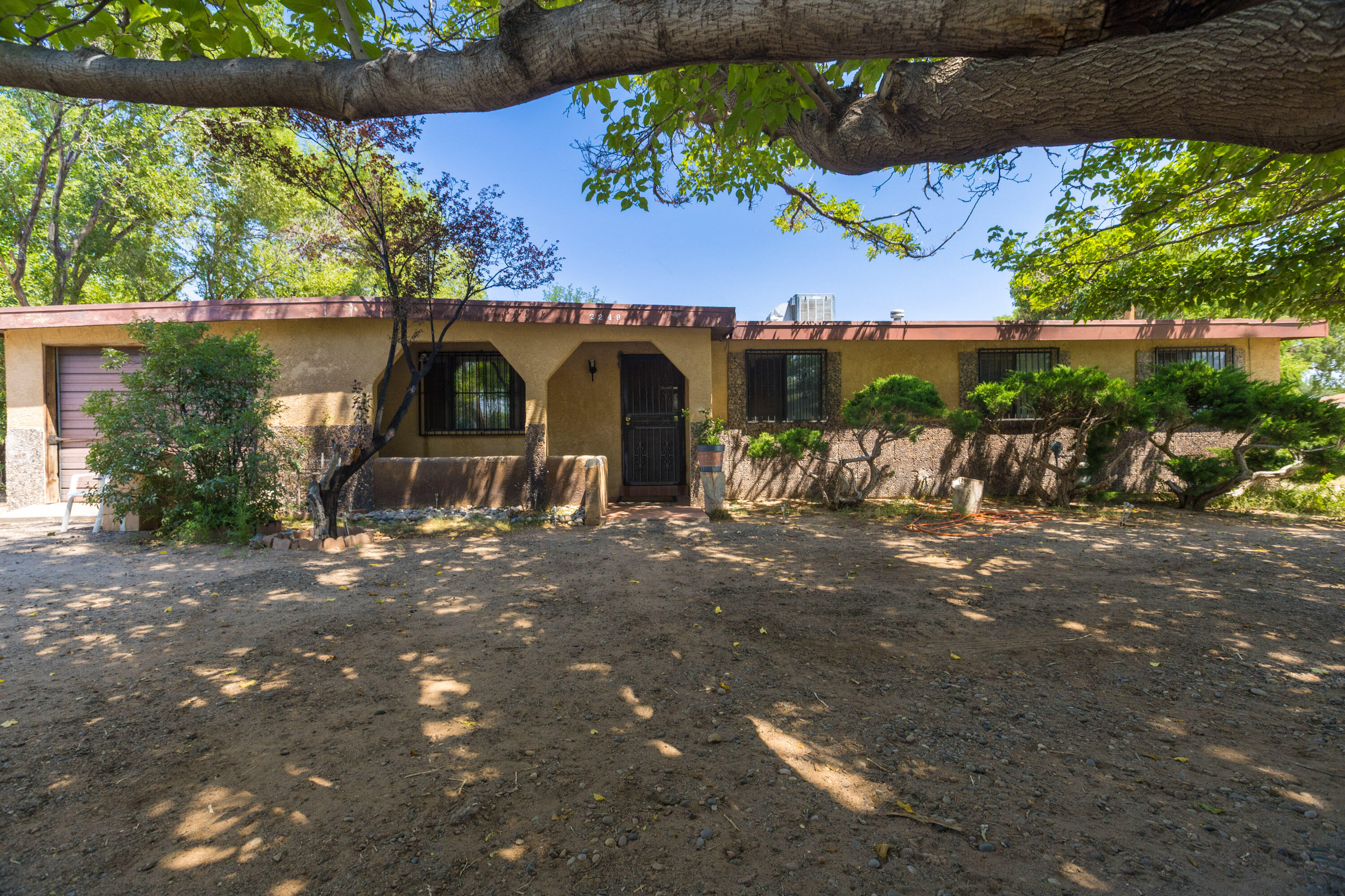 South Valley Opportunity with Bonus Lot! Located in the heart of the South Valley, this spacious property offers 5 bedrooms, 2 bathrooms, and two generously sized living areas, perfect for multi-generational living or entertaining. The open kitchen provides ample room for culinary creativity, and the additional lot adds incredible value and potential for expansion, gardening, or future development. Whether you're looking to create your dream home or invest in a property with room to grow, this gem is full of possibilities. Enjoy convenient access to shopping, schools, restaurants, and entertainment, all just minutes away.Offered in ''as is, where is'' condition. Buyers are encouraged to perform their own due diligence to verify all property details. Schedule your showing today.