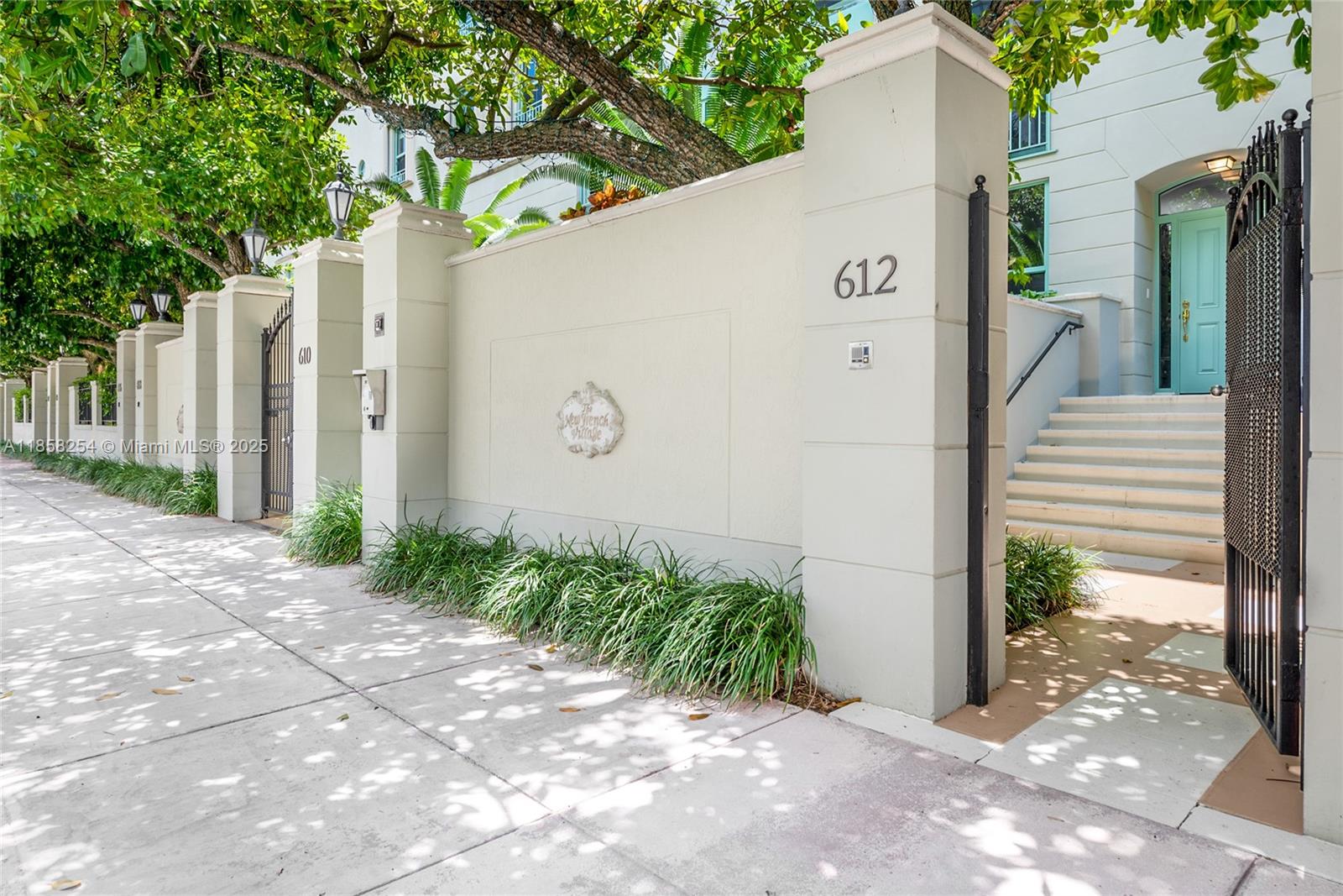 Introducing "Townhouse Four" an exceptional opportunity to own one of the townhomes in the prestigious New French Village. This two-bedroom suite residence delivers outstanding value in the heart of Coral Gables. A private gated entry leads to a garden and inviting stoop. Already a coveted property, it is deserving of a designer’s vision to maximize its full potential. Features include impact glass, two private garage spaces and an amazing, tranquil rear terrace ideal for al fresco dining... easy living!  Moments from premier dining, shopping, and golf—this is Coral Gables at its finest!