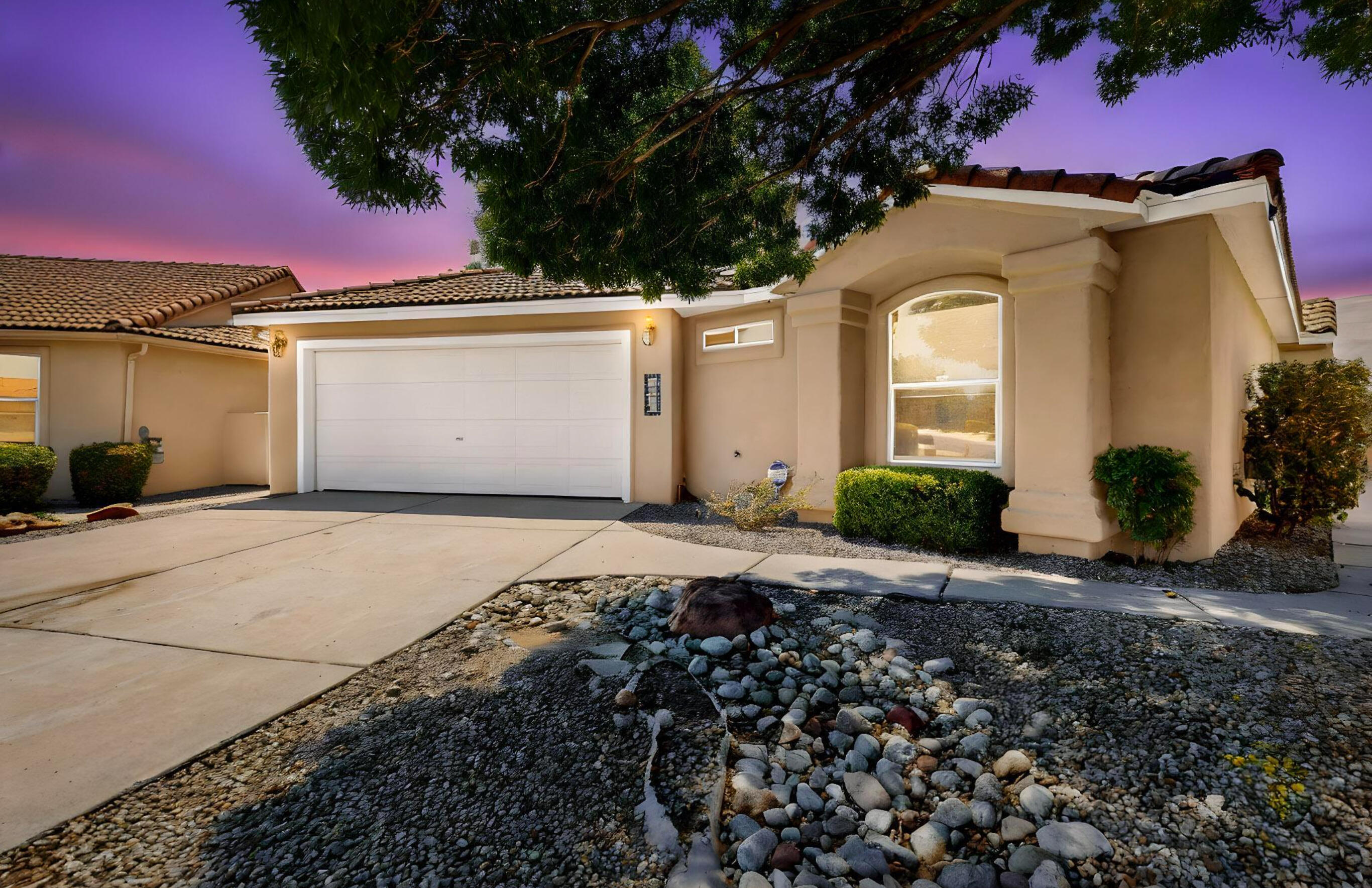 Welcome to this beautifully maintained 3-bedroom, 2-bath home located in the highly sought-after Quail Springs subdivision. Featuring raised ceilings in the main living areas, this home offers a spacious, airy feel with custom tile work and designer lighting throughout. Split floor plan for privacy.Relax in the cozy gas fireplace-equipped living room or entertain in style with two patios, a large backyard, and a private hot tub--perfect for outdoor gatherings. The kitchen and bathrooms showcase tasteful upgrades, while the primary suite boasts a luxurious bath with a soaking tub, dual vanities, and a huge walk-in closet.