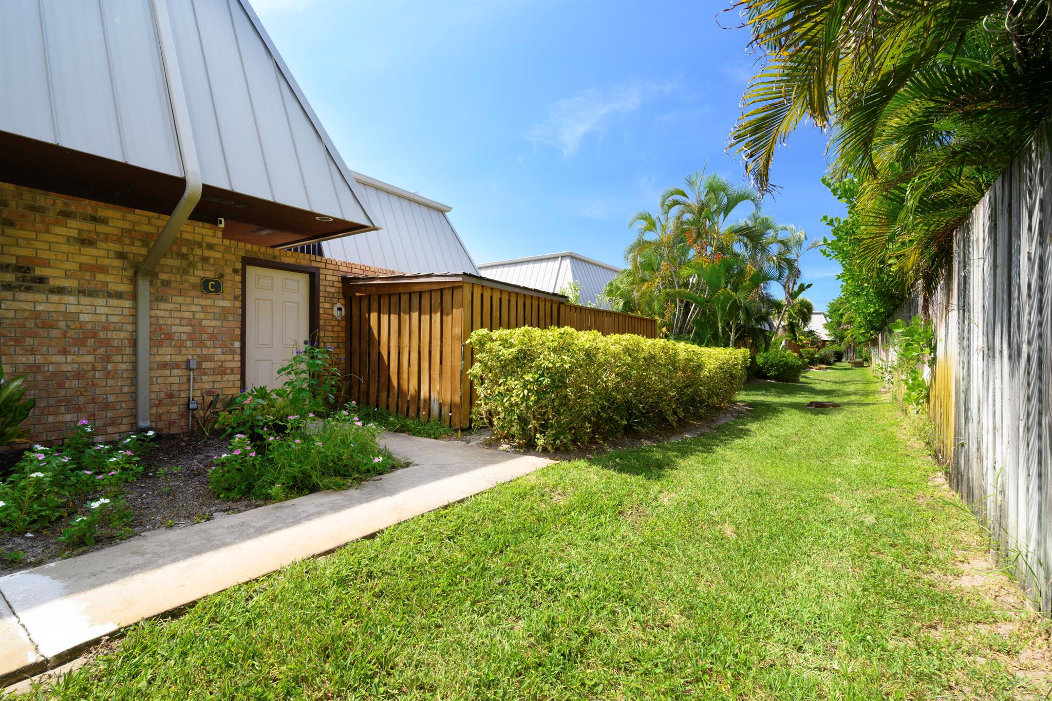 OH WOW!! Only about 3 blocks from the ocean!!A Rare find! Juno Beach (Jupiter on tax rolls) This property won't last long!! Updated Kitchen cabinets with granite countertops Very large private courtyard 29' x 24 with Potting shed! Large bedrooms, 1/2 bath on the first floor with eat-in kitchen.  Priced to Sell!Listing Price based on Appraisal on July 16th, 2025