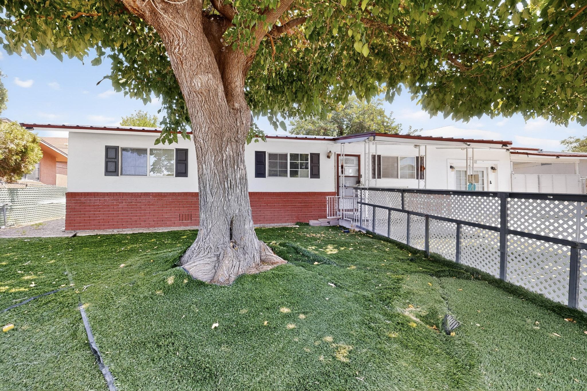 Wonderful starter home in the Albuquerque NW area that offers all the space you need in and out. In this home you will find 4 bedrooms or 3 bedrooms with a spacious bonus room that can be used as a second family area. 2 bathrooms, one located in the primary bedroom and the second bathroom is in the hallway. The second bathroom was recently renovated. The current owners have loved this home and it shows as it offers a nicely maintained front and back yard, several cosmetic updates throughout the house, newer heating & cooling system with refrigerated air, fenced backyard and durable metal roof. There is a storage room in the back yard with ample space, a covered area/carport, and easy backyard access. This home offers so many possibilities.