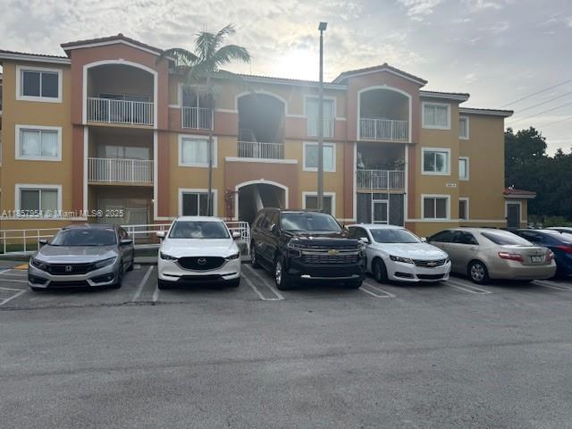 Spacious 3BR/2BA condo, freshly painted throughout and move-in ready! Enjoy a large covered balcony/patio perfect for entertaining with serene lakeside views.  Bright open living areas, separate storage room for all your personal items, comfortable layout for your family. Interior laundry room with washer and dryer.  Prime location off Old Cutler Rd, close to Black Point Marina, top restaurants, shopping and excellent schools.  Lush surroundings make this a perfect place to call home.  This unit is located on the third floor, quiet community with 2 parking spaces provided.  Perfect area to bike and walk to the marina or schools nearby. Plenty of room for kids to play on beautiful lawns around the lake and community.