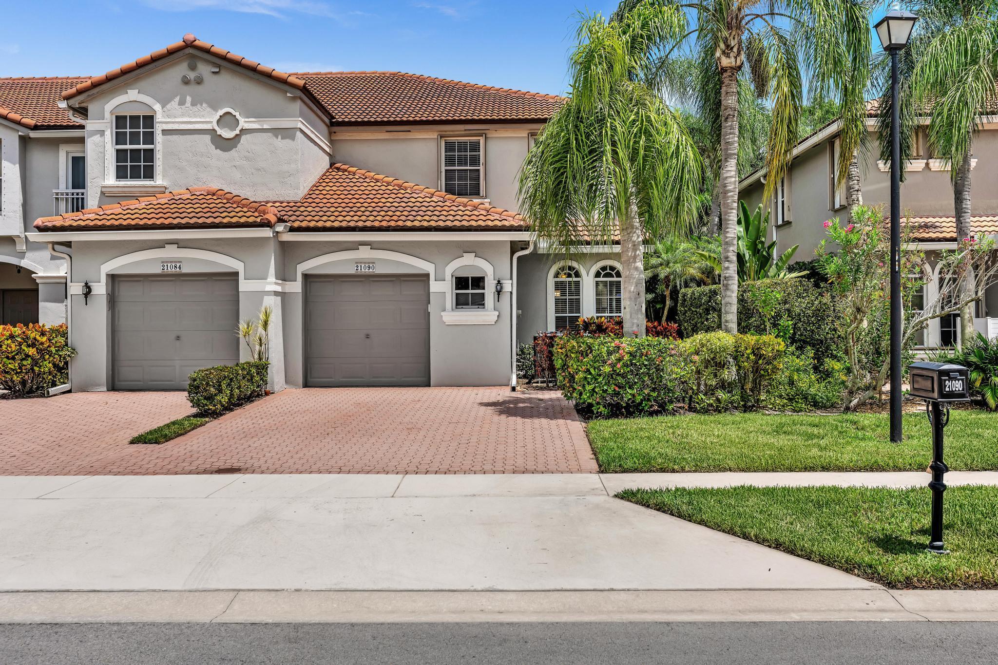 Largest and Rarely available 2 story corner unit in very desirable Mizner Pointe. 3 bdr PLUS loft that can easily be converted back a to 4th bdr, used as an office/playroom. Neutral Tile throughout downstairs. All white kitchen with granite counters. Separate dining /living room. Spacious, light & bright family room with added breakfast area. Laundry on 2nd floor. Large one car garage. Roof is a few years old. 2nd floor has accordion shutters/ 1st floor has panels. This beautifully maintained community includes 24 hr manned gate, clubhouse, community pool, tennis, playground, gym and more. Pet friendly! Fantastic location, near shops, great restaurants & mins to the Turnpike. Great schools! Perfect opportunity to live in this sought after neighborhood!