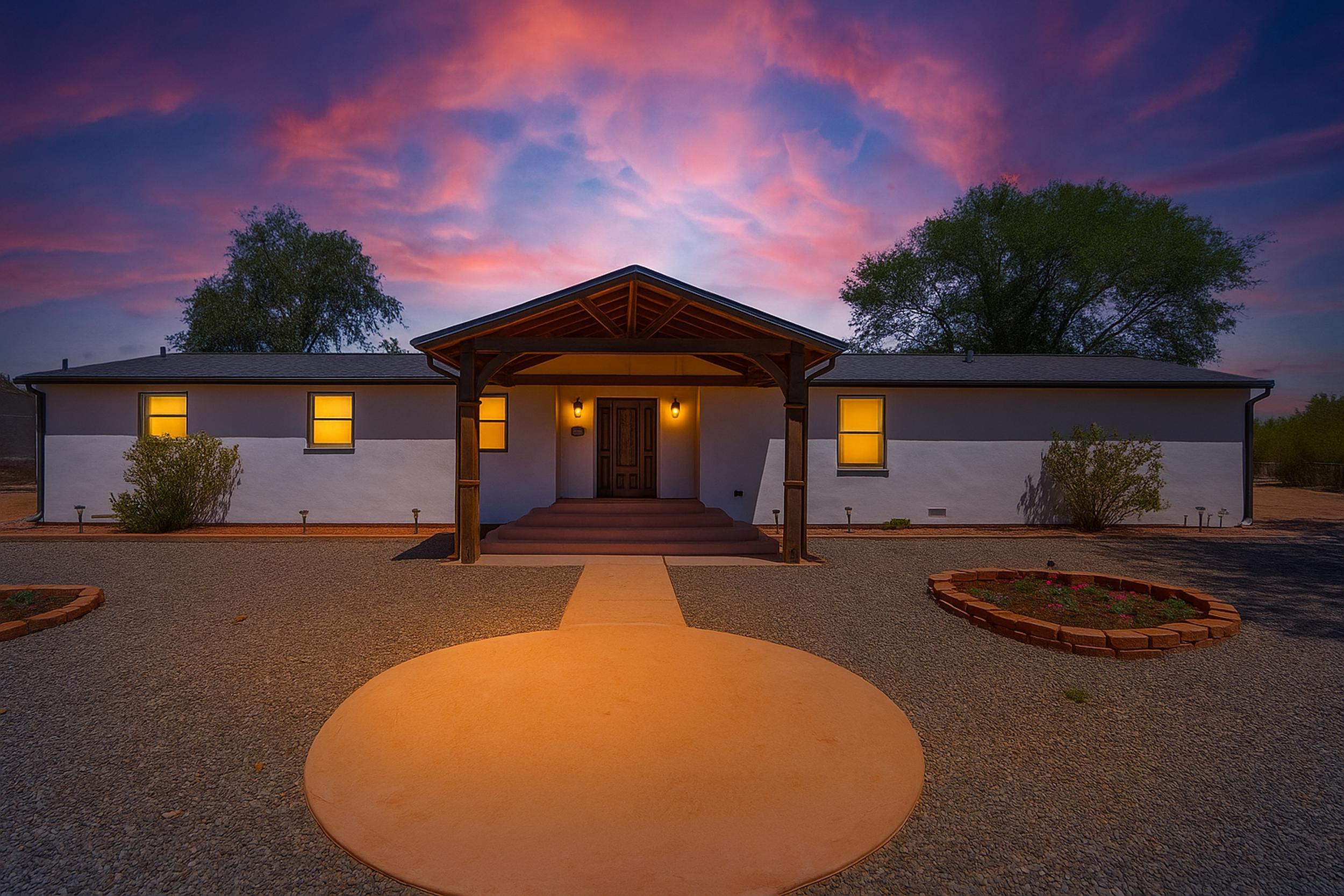 Rare 1+ Acre Property with Stunning Modular Home & Dream Garage!Discover this beautifully maintained 4-bedroom, 2.5-bath home on a rare 1.07-acre lot in the Albuquerque valley. Inside, enjoy two spacious living areas, a cozy fireplace, and a bright, open layout. Recent upgrades include a new roof, updated electrical, refrigerated A/C, fresh stucco, and more.The showstopper? A brand-new 3-car garage with 8-foot roll-up doors plus a 10-foot door -- perfect for oversized vehicles, hobbies, or extra storage. Don't forget about the EV charger, ready for your electric vehicle! Outside, the expansive lot offers room to spread out, garden, or simply enjoy the peaceful surroundings. This property blends comfort, style, and functionality in one incredible package.