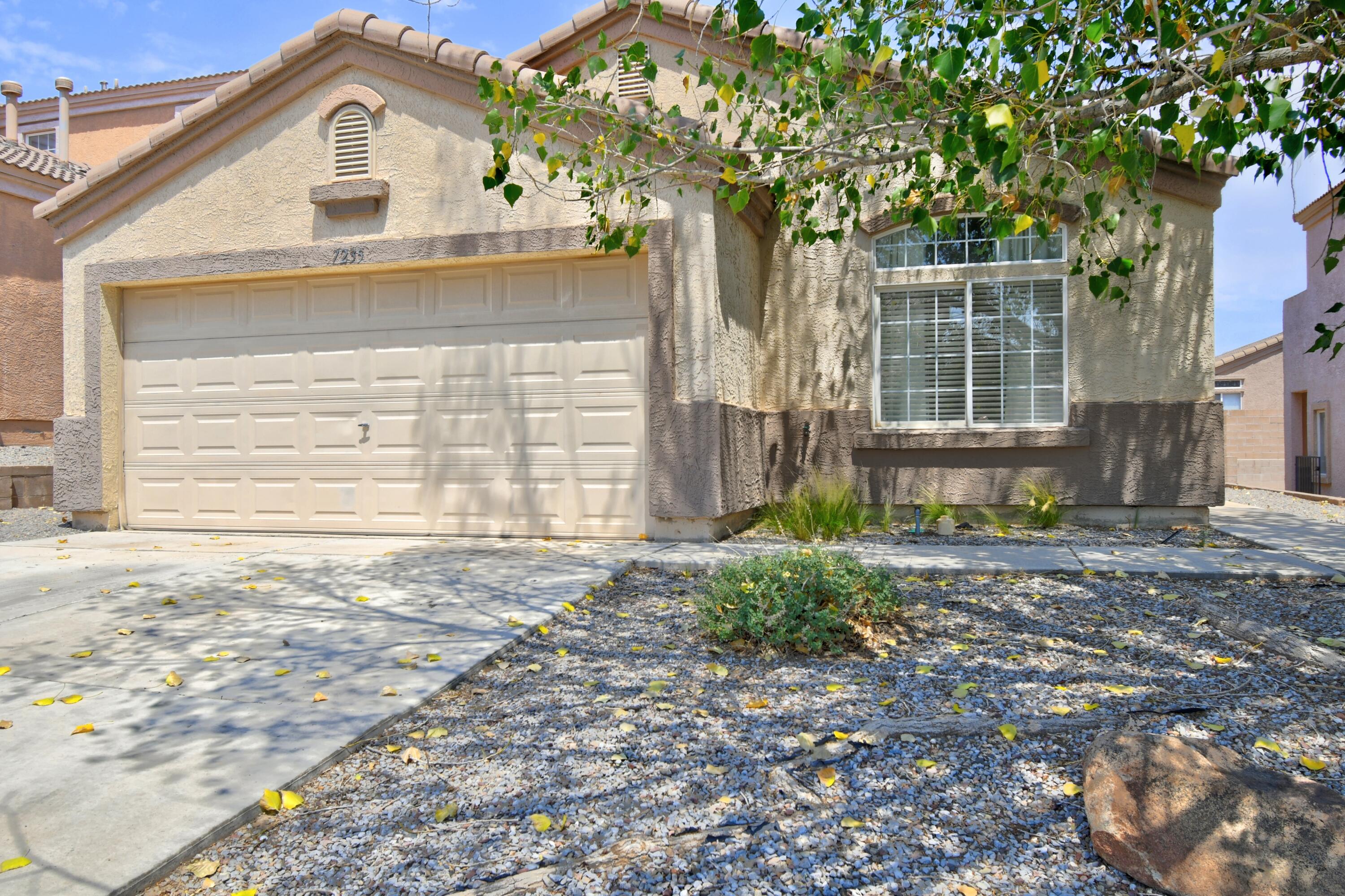 Located in a desirable neighborhood, 7235 Teypana Road NW offers 4 bedrooms, 2 baths, and a 2-car garage. The home features a cozy kitchen perfect for everyday meals, opening to generous living spaces ideal for relaxing or entertaining. The primary bedroom is spacious, complemented by three nicely sized additional bedrooms. A charming backyard provides a peaceful outdoor retreat. With a durable tile roof and beautiful stucco the out side of the property looks great. The property is close to great schools, a nearby park, and just minutes from restaurants and shopping.