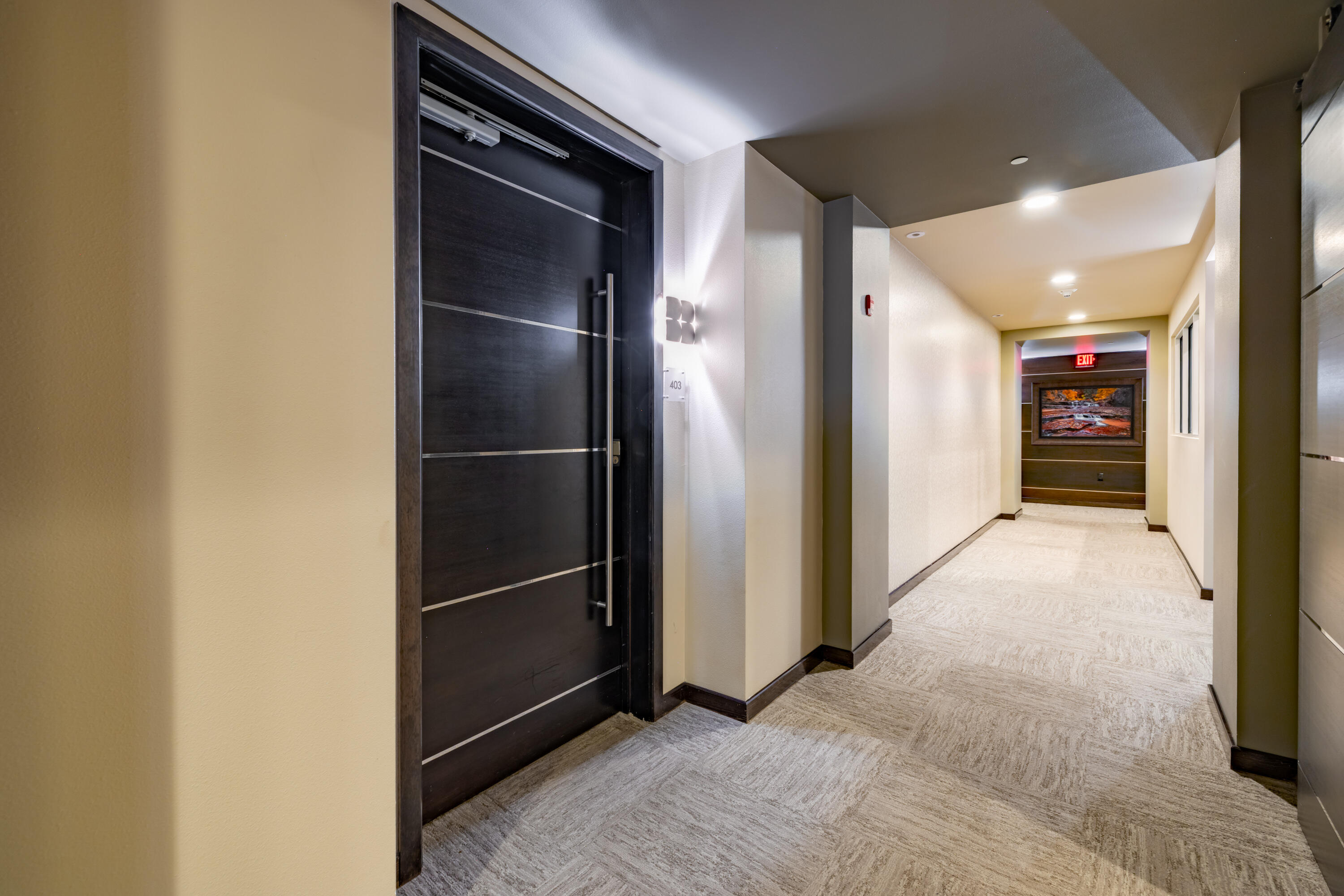 This fabulous mid-rise luxury condo is one of a kind in Albuquerque! Enjoy the convenience of a lock and leave lifestyle with a fully secured building within walking distance of great dining, shopping, and entertainment. This fabulous condo is located on the 4th floor and offers stunning views to the West. Beautiful designer finishes include wood plank porcelain tile, storefront windows, sleek Shaker style cabinetry, quartz countertops, and Wolf/ Subzero appliances. Additional amenities include a gym for residents, 2 secured underground parking spaces, 2 large storage rooms for each unit, and key card secured elevator access to all floors. Enjoy the ease of maintenance only attained through a full service building. This sleek and sophisticated building offers a rare lifestyle opportunity.