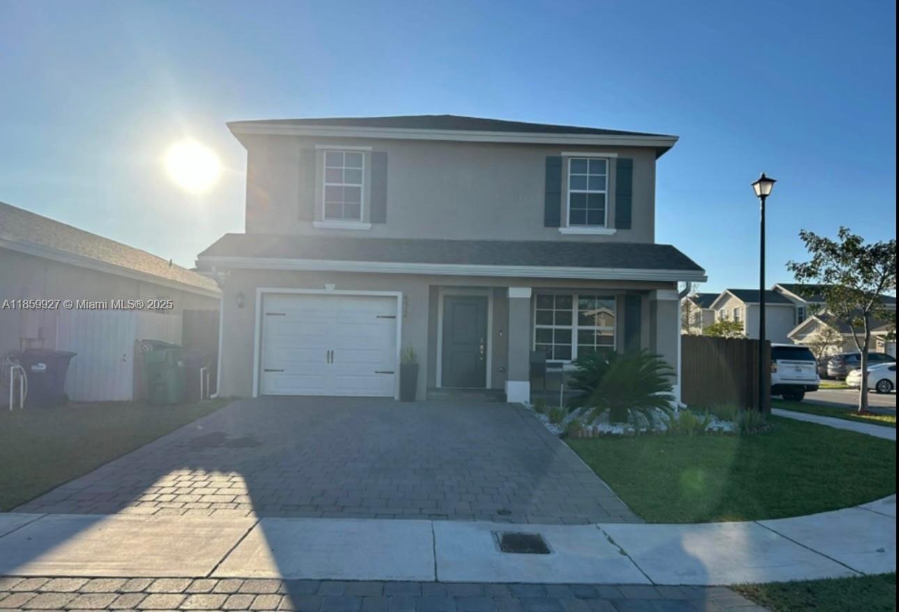 Beautifully remodeled 4/3 in Florida City.  Property has beautiful ceramic tiles that look like wood in the bottom floors and comfortable carpet in the top floors. Open kitchen with granite counter tops and white cabinets. Beautifully remodeled bathrooms. charming corner home is perfectly located next to the Florida City Outlets and just minutes from the Florida Keys a dream location for anyone who loves the beach and coastal living. Enjoy quick access to the expressway for easy commuting, top-rated local schools, and the convenience of Publix just 3 minutes away.The property features a spacious backyard and an side yard, offering plenty of space for entertaining, gardening, or even adding a pool in the future. For just 110/mo of hoa dues residents enjoy full landscaping of their property.