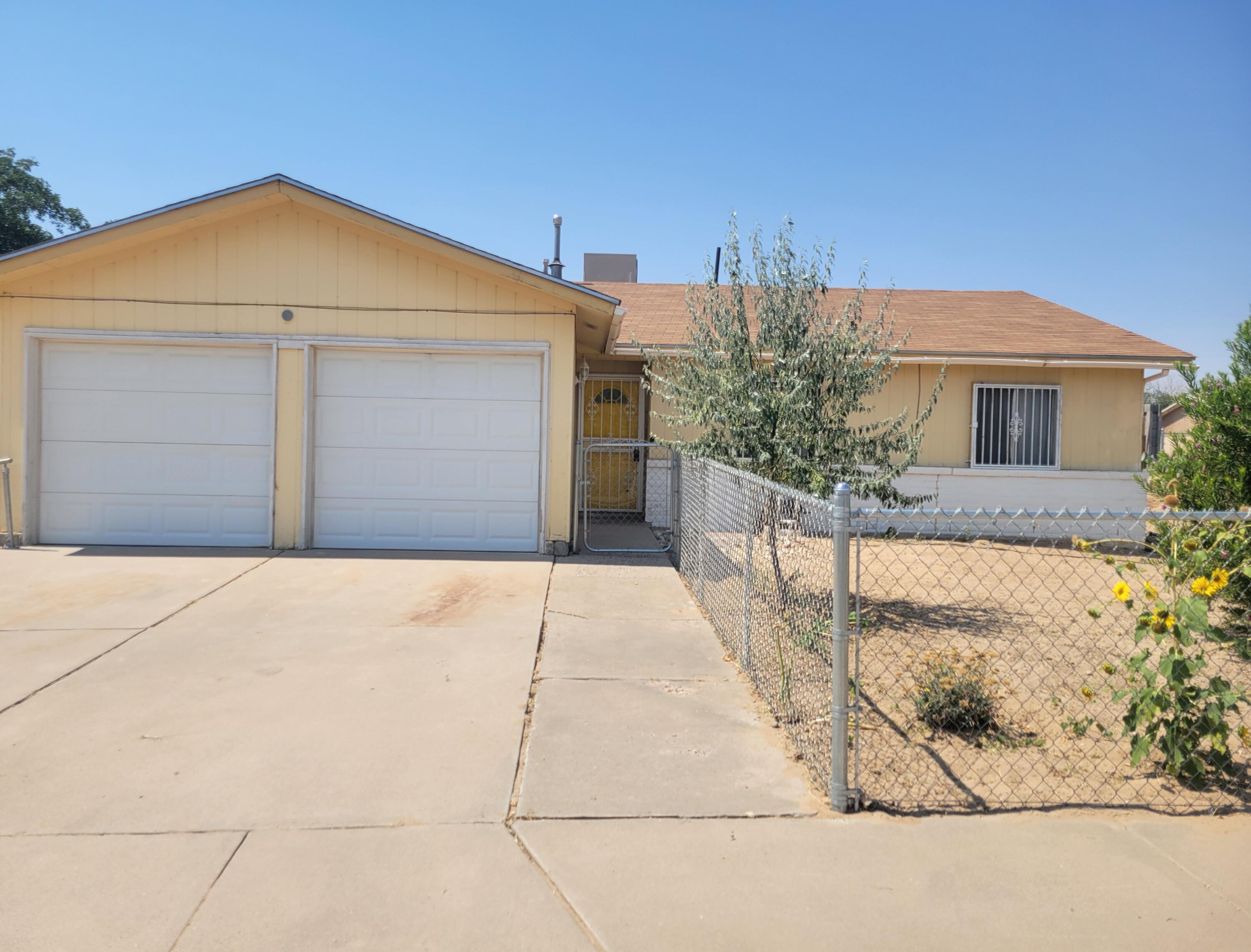 Come see this charming home sitting on a large corner lot with plenty of space. This 4 bdrm home with 2 bathrooms has an open floorplan and located in an established neighborhood.  Home has a fenced yard in the front and back with plenty of privacy. $5,000 concession credit towards buyers closing fees.  Move quickly before it's gone.