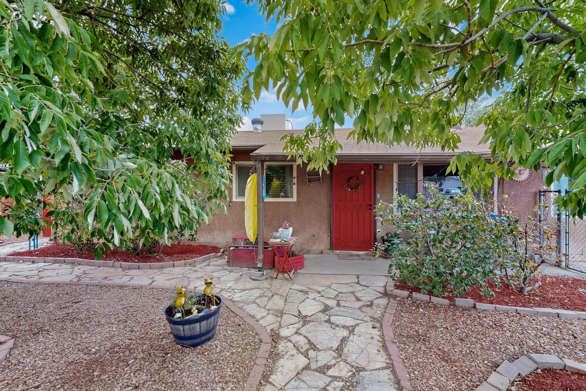 Come see this gorgeous 4 bedroom, 2 bath house on a quiet street in the heart of northern Bernalillo.  Updated kitchen and bathrooms.  Bonus ''gym'' could be used as an extra family room, media room or bedroom.  Enjoy your coffee in the screened porch or one of 4! separate sitting/eating/patio areas in the back yard, or under the shade of the trees in the front yard.  Bonus is the views of the Sandias from your beautifully Xeriscaped back yard.   Property is fully fenced for the safety of your family or furbabies.  Gated access to the backyard from Camino Don Tomas. Quick access to 550 and I-25 makes for an easy commute to work.