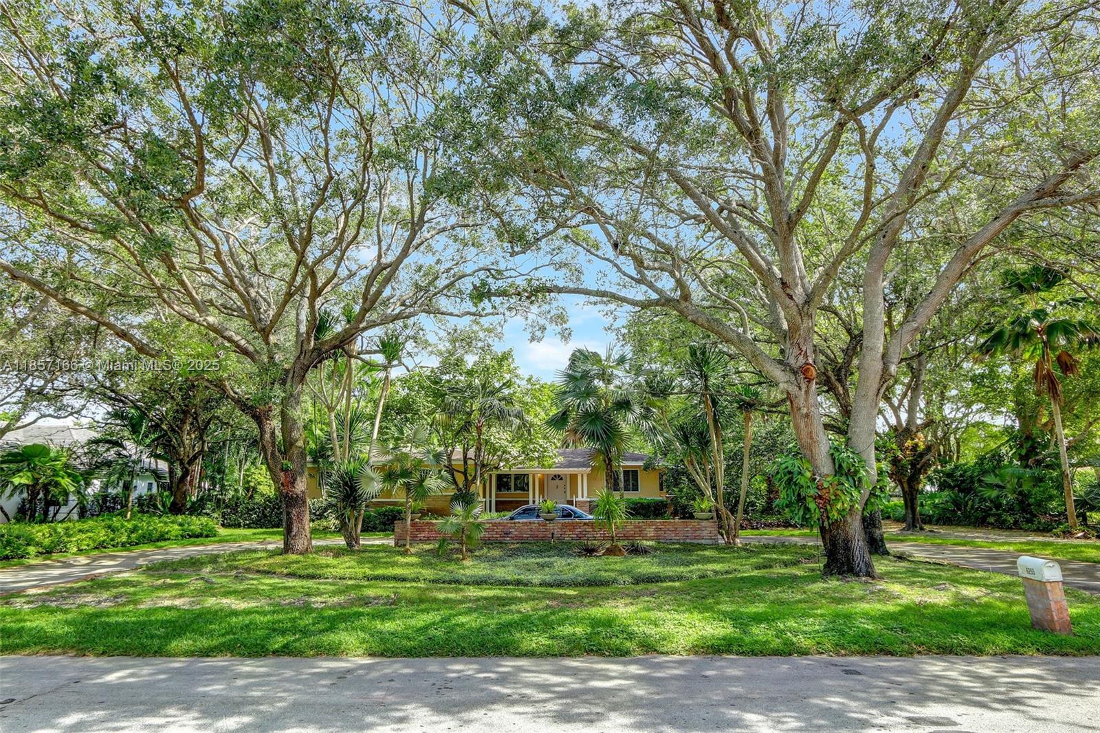 This charming 3,770 sq. ft. home is nestled in one of North Pinecrest’s most desirable locations, surrounded by multimillion-dollar mansions. The 4-bedroom, 3-bath layout features a stunning master suite overlooking the sparkling pool and lush patio—a peaceful retreat from everyday life. The bright kitchen with breakfast nook and dining area is perfect for entertaining or family meals, while the convenient cabana bath offers easy poolside access. An extra room provides flexibility for a home office or den. With a double garage, two driveways, and a generously sized lot shaded by mature trees, This is the most economical rental in Pinecrest on a per-square-foot basis.