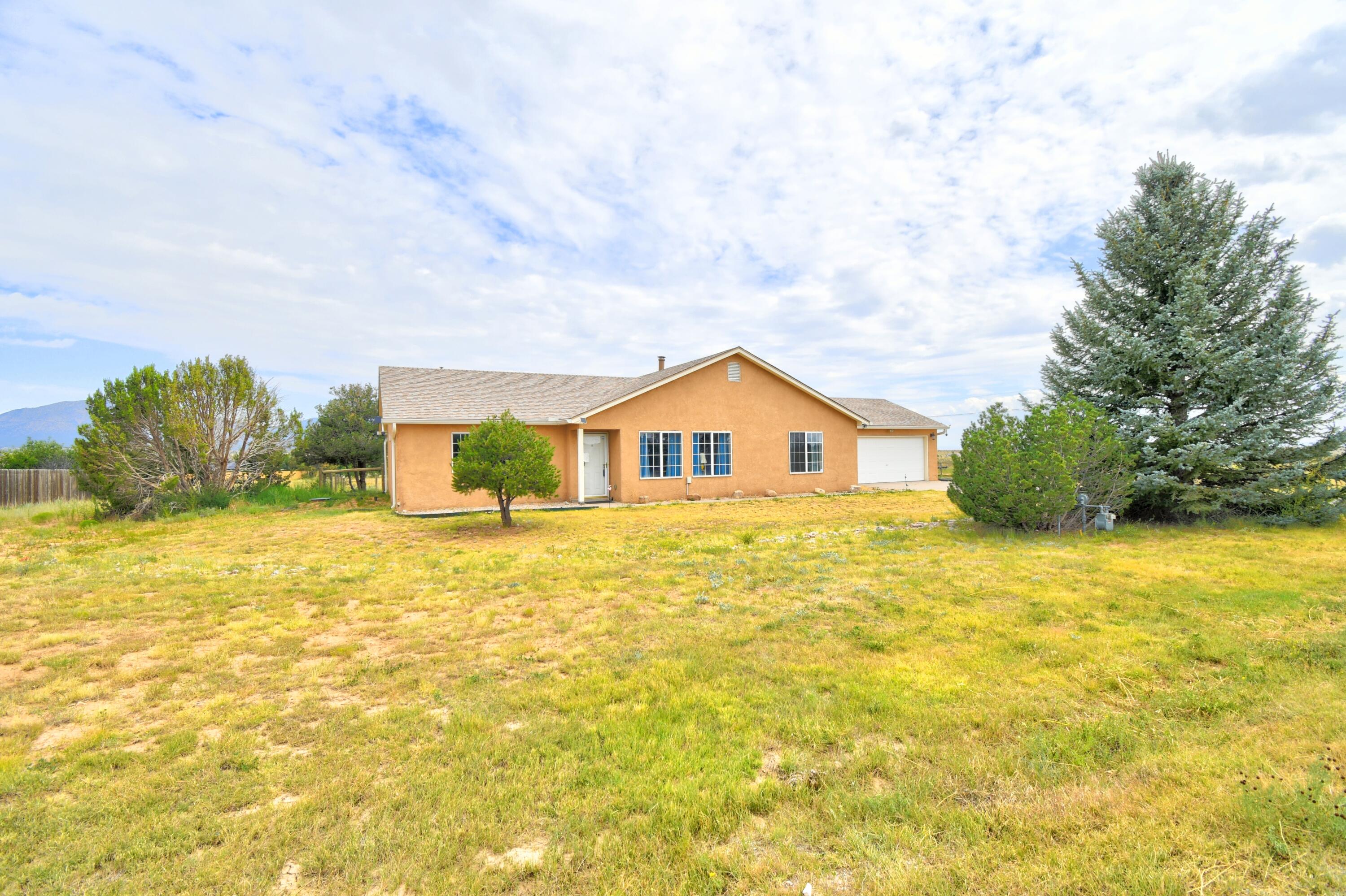Fresh upgrades & country charm all in one! Welcome to this beautifully updated 3-bedroom, 2-bath home sitting on just over an acre in Edgewood. Inside, you'll love the open floor plan, spacious kitchen with plenty of storage, and a private primary suite set apart from the other bedrooms. The oversized garage offers room for a workshop, hobbies, or extra storage.Step outside to enjoy sweeping views of the mountain, a brand-new roof(2024), new septic system(2024), and new gutters(2024) all added within the last year! There's a dedicated RV space with a 20-amp hookup perfect for your travel trailer or weekend guests. Fiber internet to the home!!